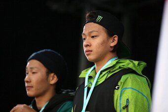 WANAKA, NEW ZEALAND - AUGUST 24:  Ayumu Hirano of Japan poses on the podium after winning the Mens FIS Snowboard Halfpipe World Cup Finals on day 10 of the Winter Games NZ on August 24, 2013 in Wanaka, New Zealand.  (Photo by Hannah Johnston/Getty Images)