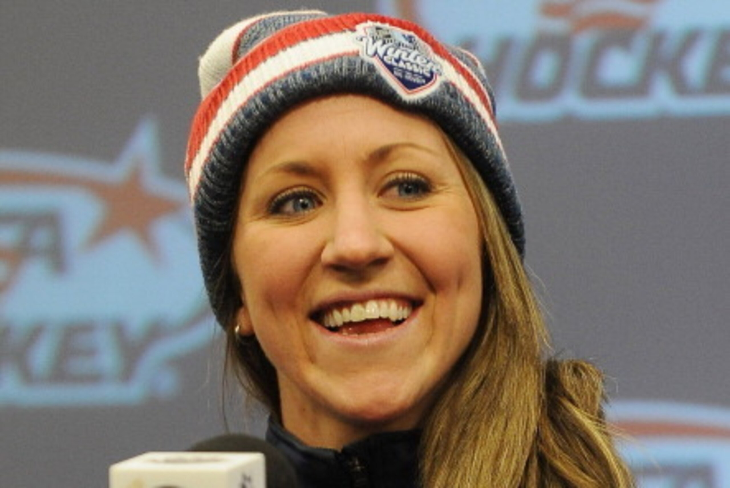 ANN ARBOR, MI - JANUARY 01: Meghan Duggan of the United States Women's hockey team for the 2014 Sochi Olympics is interviewed at a press conference during the 2014 Bridgestone NHL Winter Classic on January 1, 2014 at Michigan Stadium in Ann Arbor, Michiga