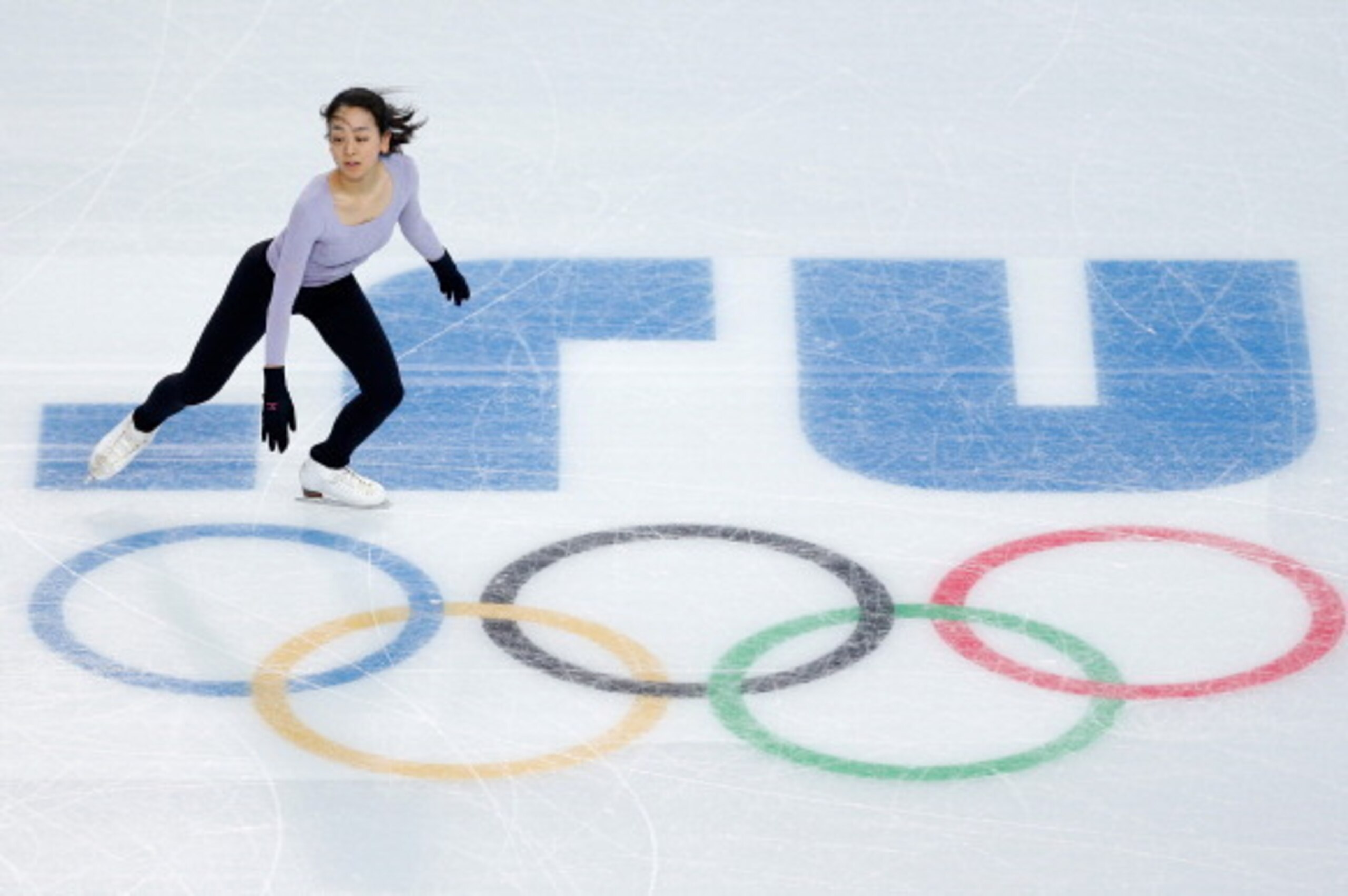 SOCHI, RUSSIA - FEBRUARY 06:  Figure skater Mao Asada of Japan practices at the Iceberg Skating Palace on February 6, 2014 in Sochi, Russia.  (Photo by Matthew Stockman/Getty Images)