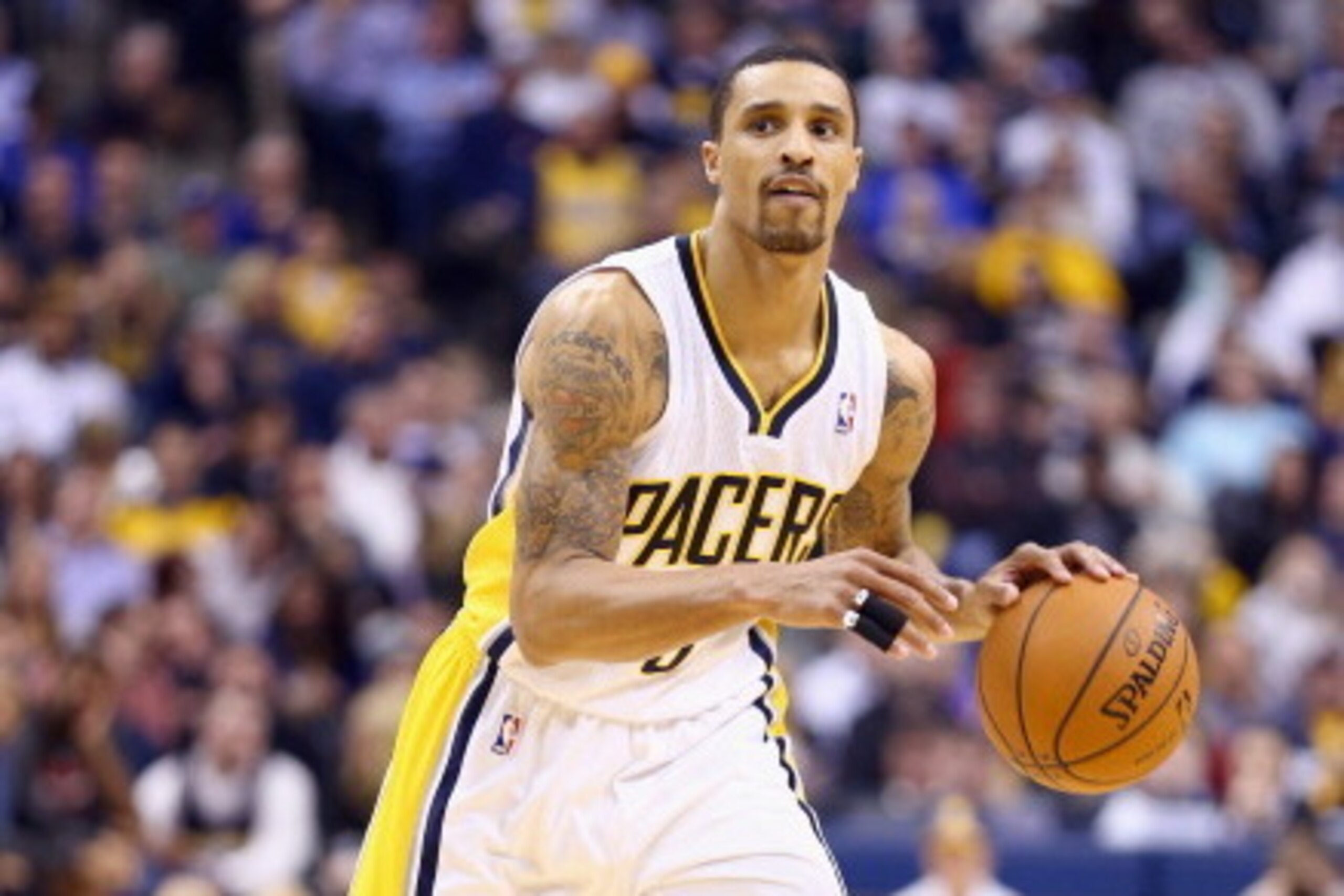 INDIANAPOLIS, IN - FEBRUARY 07:  George Hill #3 of the Indiana Pacers dribbles the ball during the game against the Portland Trailblazers  at Bankers Life Fieldhouse on February 7, 2014 in Indianapolis, Indiana.  NOTE TO USER: User expressly acknowledges 