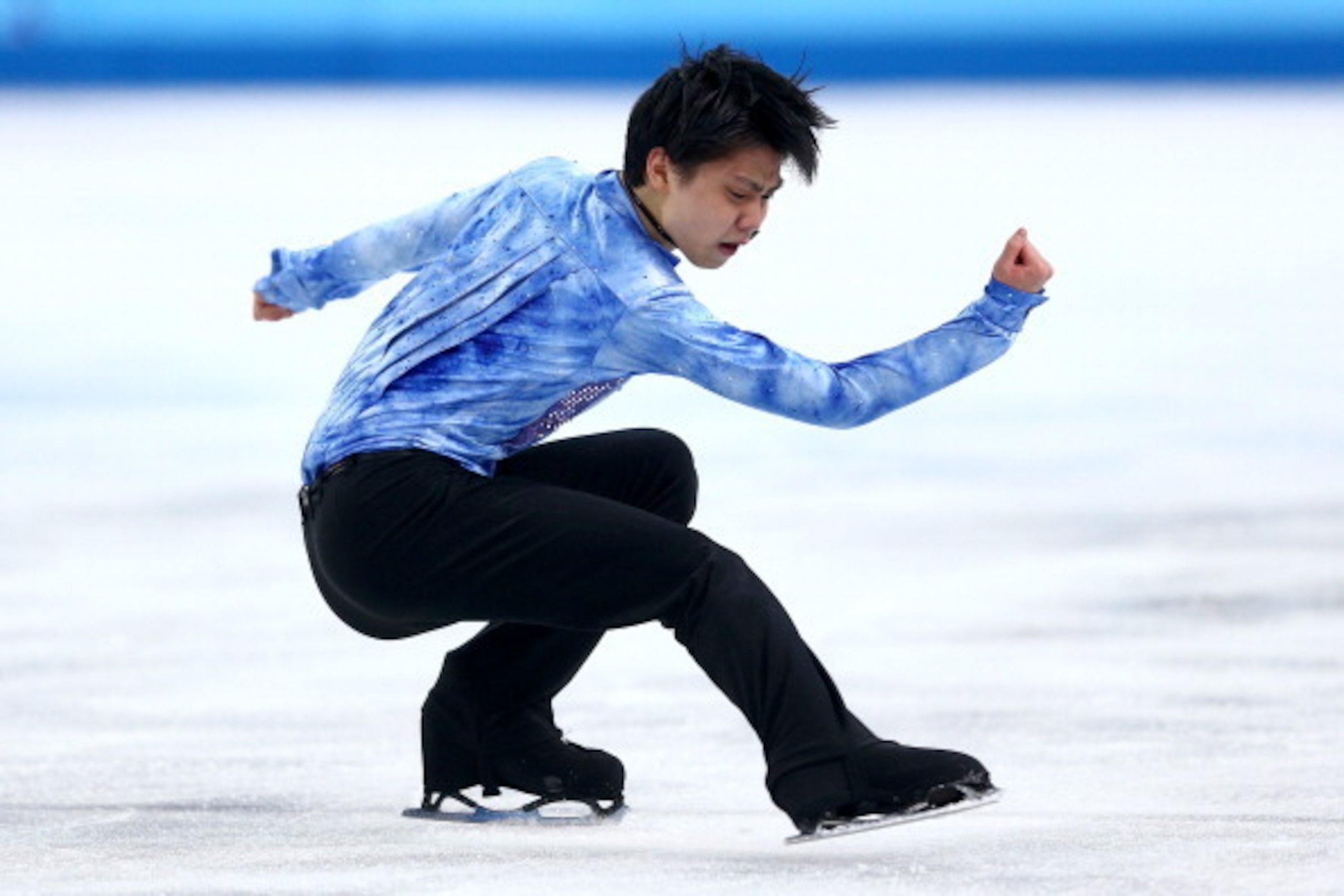 SOCHI, RUSSIA - FEBRUARY 06:  Yuzuru Hanyu of Japan competes in the Figure Skating Men's Short Program during the Sochi 2014 Winter Olympics at Iceberg Skating Palace on February 6, 2014 in Sochi, Russia.  (Photo by Clive Mason/Getty Images)