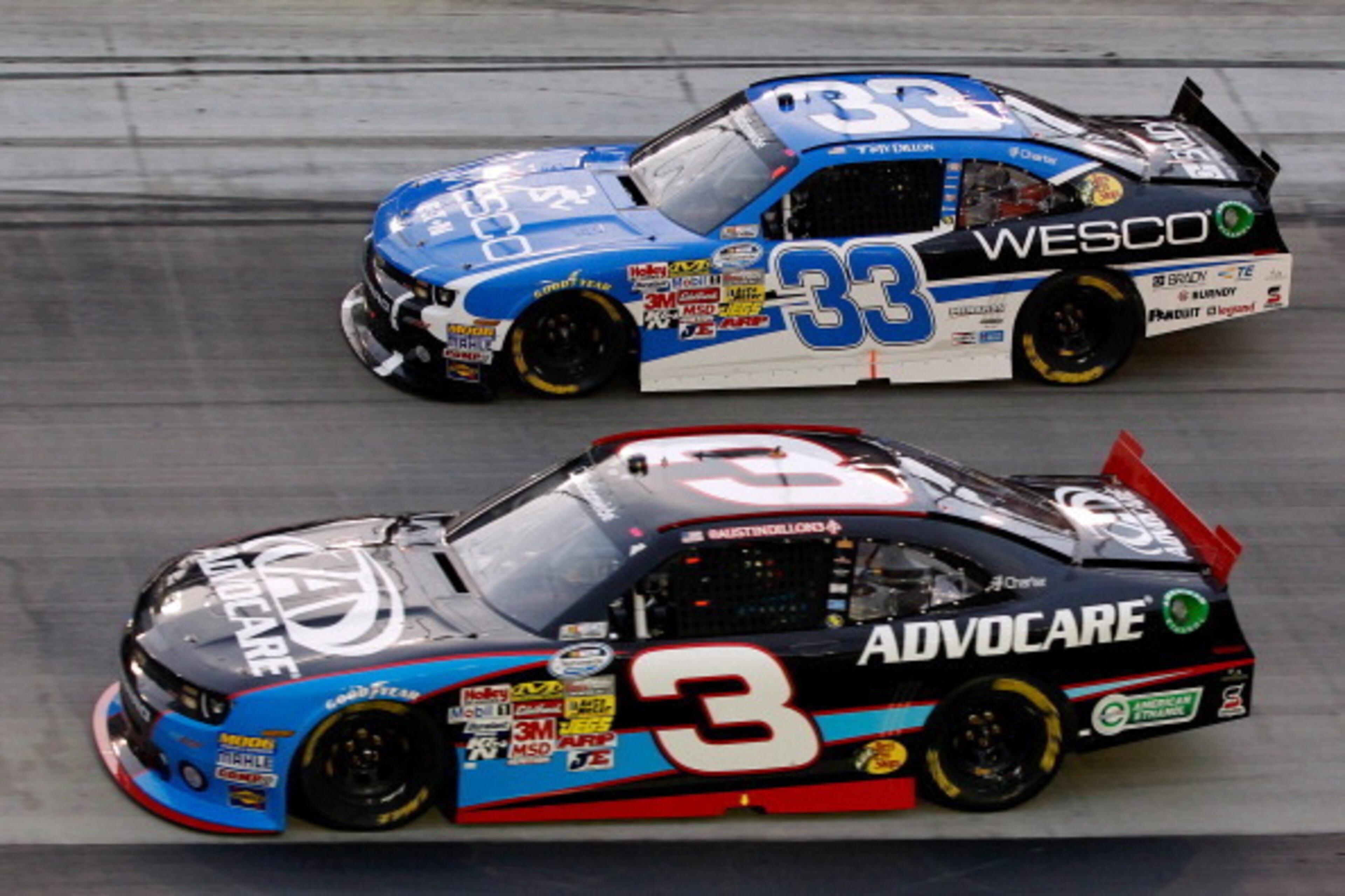 BRISTOL, TN - AUGUST 23:  Austin Dillon, driver of the #3 AdvoCare Chevrolet, races Ty Dillon, driver of the #33 WESCO Chevrolet, during the NASCAR Nationwide Series Food City 250 at Bristol Motor Speedway on August 23, 2013 in Bristol, Tennessee.  (Photo