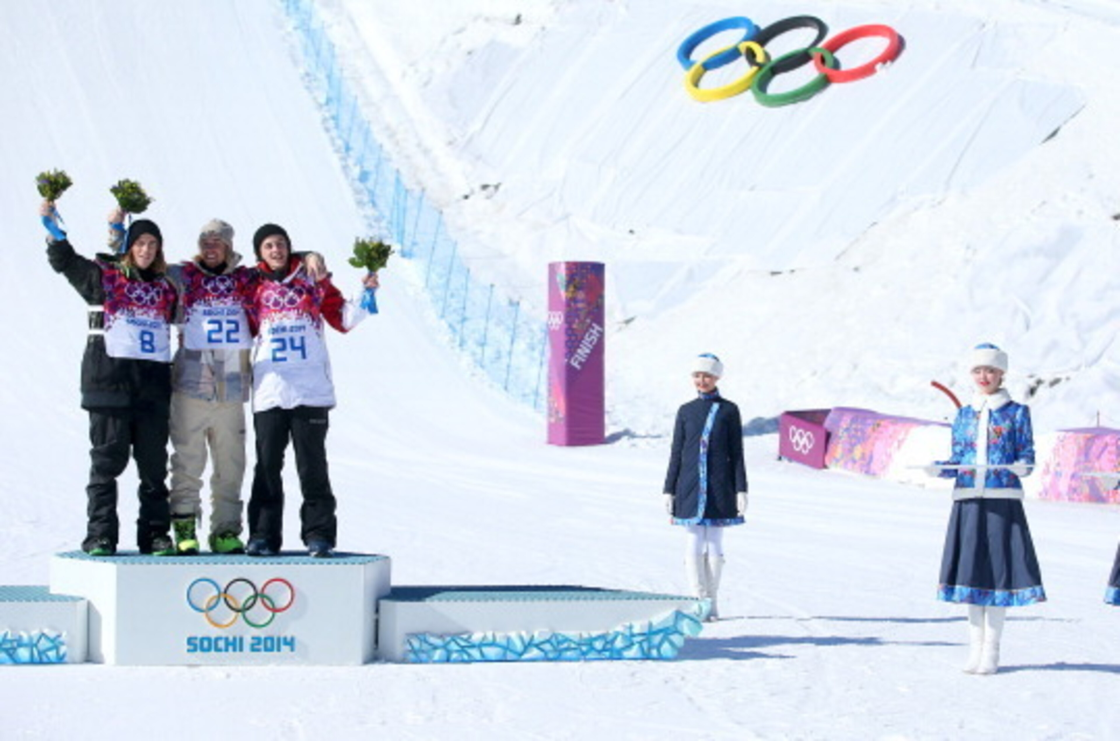 SOCHI, RUSSIA - FEBRUARY 08: (L-R) Silver medalist Staale Sandbech of Norway, gold medalist Sage Kotsenburg of the United States and bronze medalist Mark McMorris of Canada pose on the podium during the flower ceremony following the Snowboard Men's Slope SOCHI, RUSSIA - FEBRUARY 08: (L-R) Silver medalist Staale Sandbech of Norway, gold medalist Sage Kotsenburg of the United States and bronze medalist Mark McMorris of Canada pose on the podium during the flower ceremony following the Snowboard Men's Slope