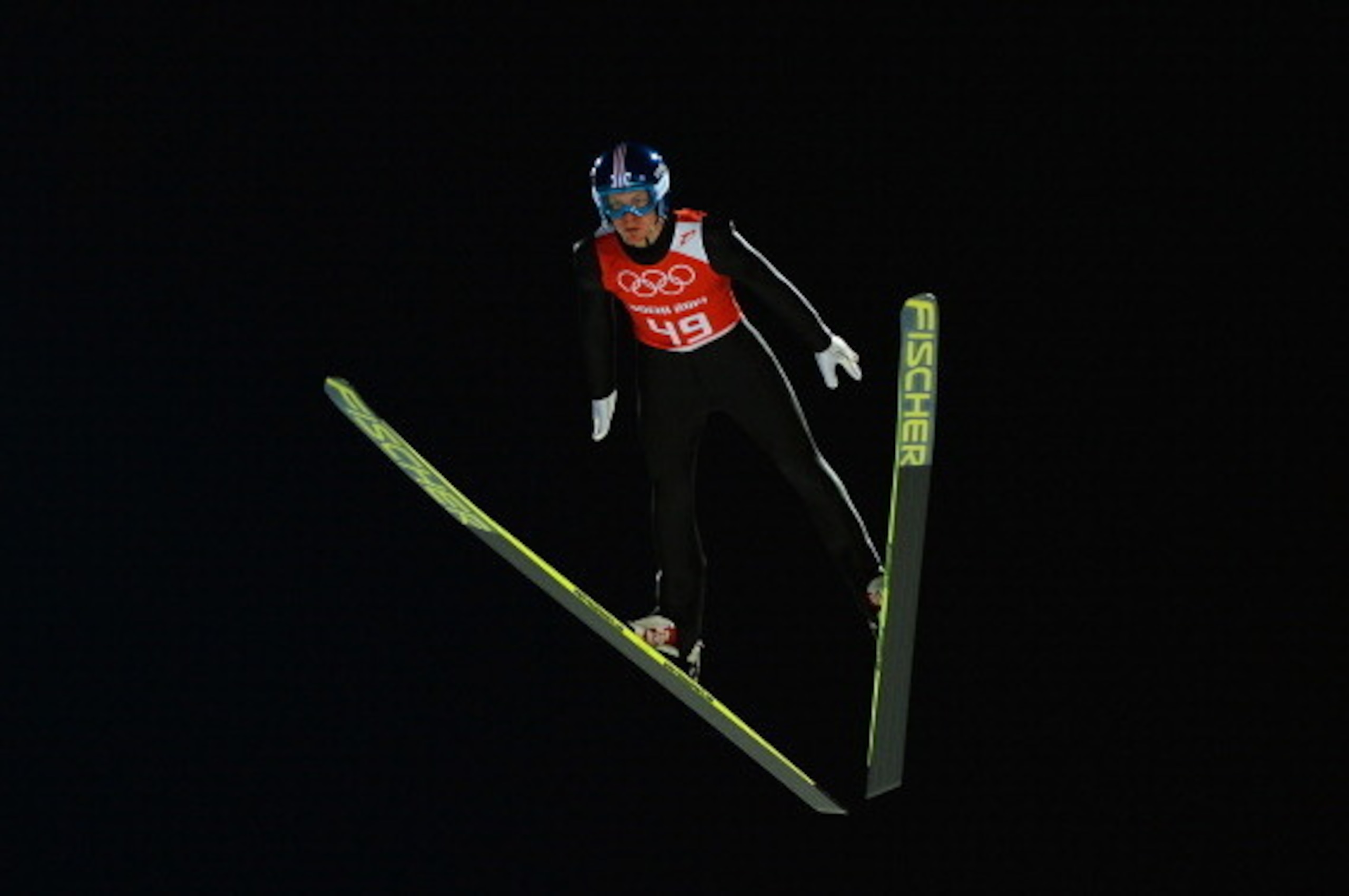 SOCHI, RUSSIA - FEBRUARY 06:  Michael Hayboeck of Austria jumps during the Men's Normal Hill Individual Ski Jumping training ahead of the Sochi 2014 Winter Olympics at the RusSki Gorki Ski Jumping Center on February 6, 2014 in Sochi, Russia.  (Photo by La