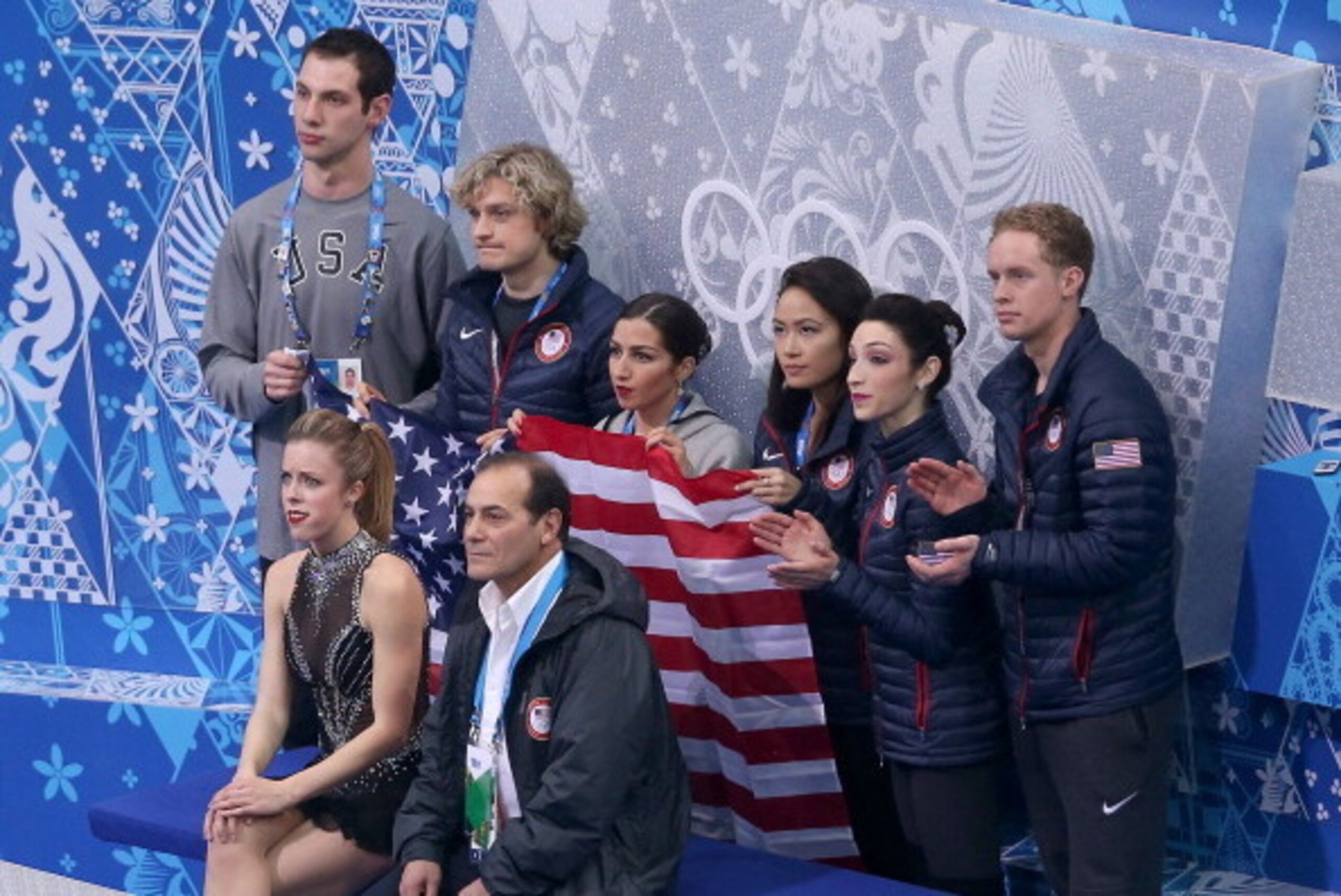 SOCHI, RUSSIA - FEBRUARY 08: Ashley Wagner of the United States waits for her score with teammates and coaches during the Figure Skating Team Ladies Short Program during day one of the Sochi 2014 Winter Olympics at Iceberg Skating Palace on February 8, 2 SOCHI, RUSSIA - FEBRUARY 08: Ashley Wagner of the United States waits for her score with teammates and coaches during the Figure Skating Team Ladies Short Program during day one of the Sochi 2014 Winter Olympics at Iceberg Skating Palace on February 8, 2