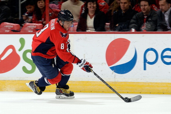 WASHINGTON, DC - FEBRUARY 06:  Alex Ovechkin #8 of the Washington Capitals controls the puck in the first period during an NHL game against the Winnipeg Jets at Verizon Center on February 6, 2014 in Washington, DC.  (Photo by Patrick McDermott/NHLI via Ge