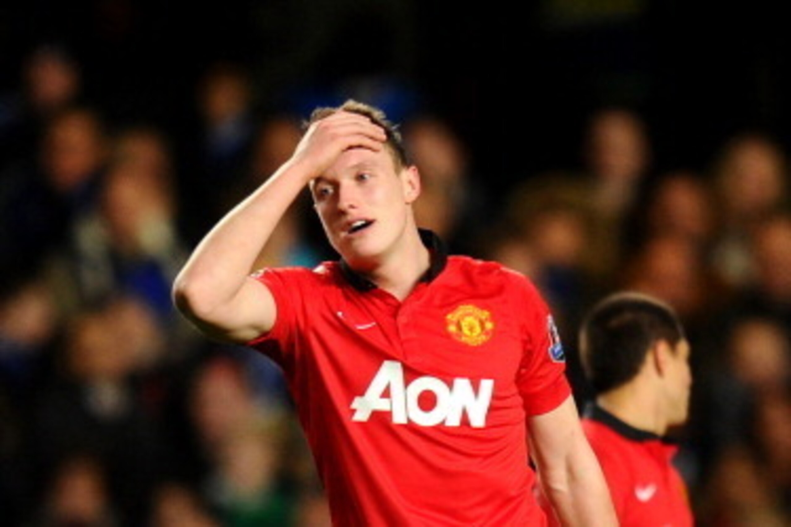LONDON, ENGLAND - JANUARY 19:  Phil Jones of Manchester United shows his frustration during the Barclays Premier League match between Chelsea and Manchester United at Stamford Bridge on January 19, 2014 in London, England.  (Photo by Mike Hewitt/Getty Ima