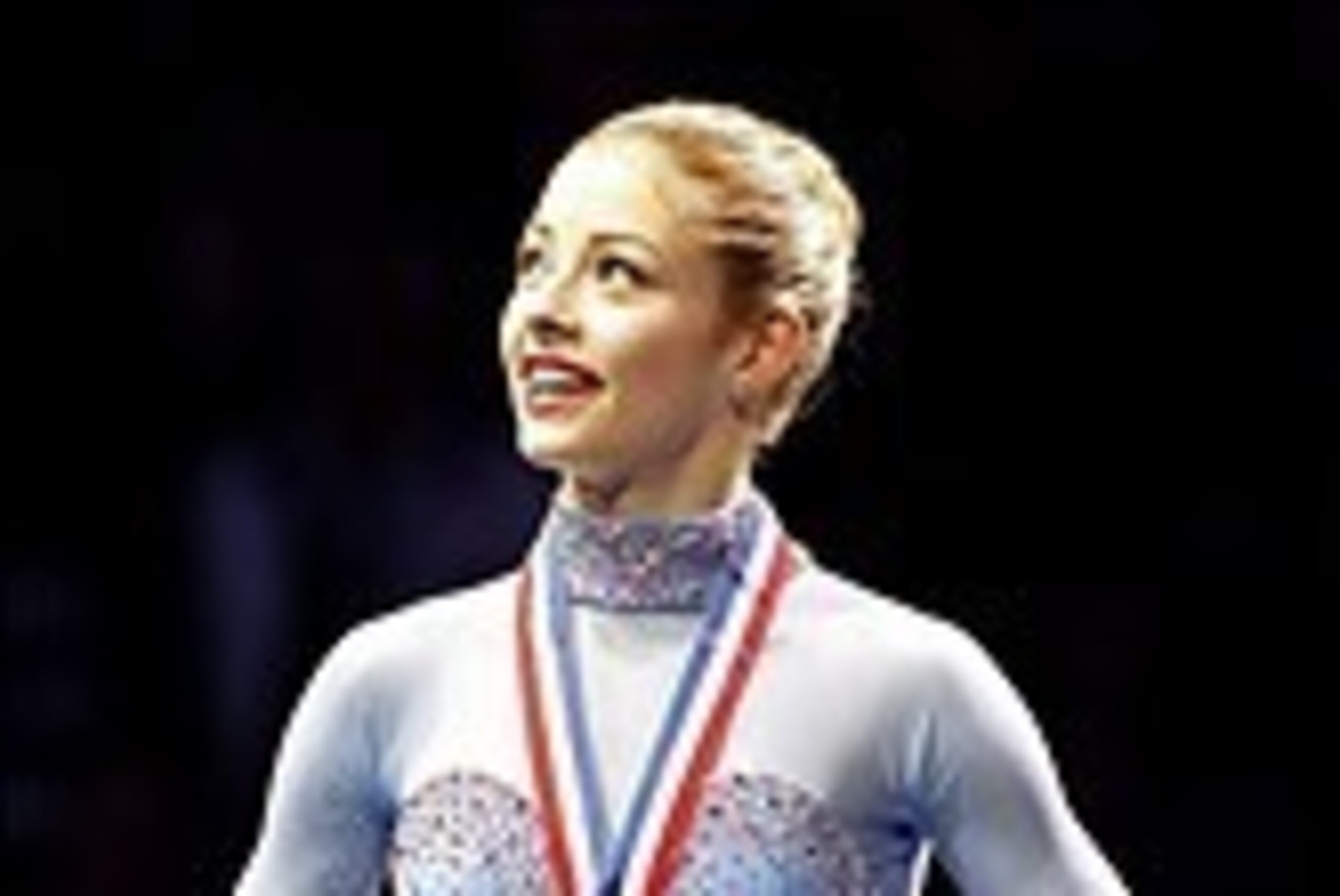 Jan 11, 2014; Boston, MA, USA; Gold medalist- Gracie Gold on the podium after the Ladies Free Skate at the TD Garden. Mandatory Credit: Greg M. Cooper-USA TODAY Sports