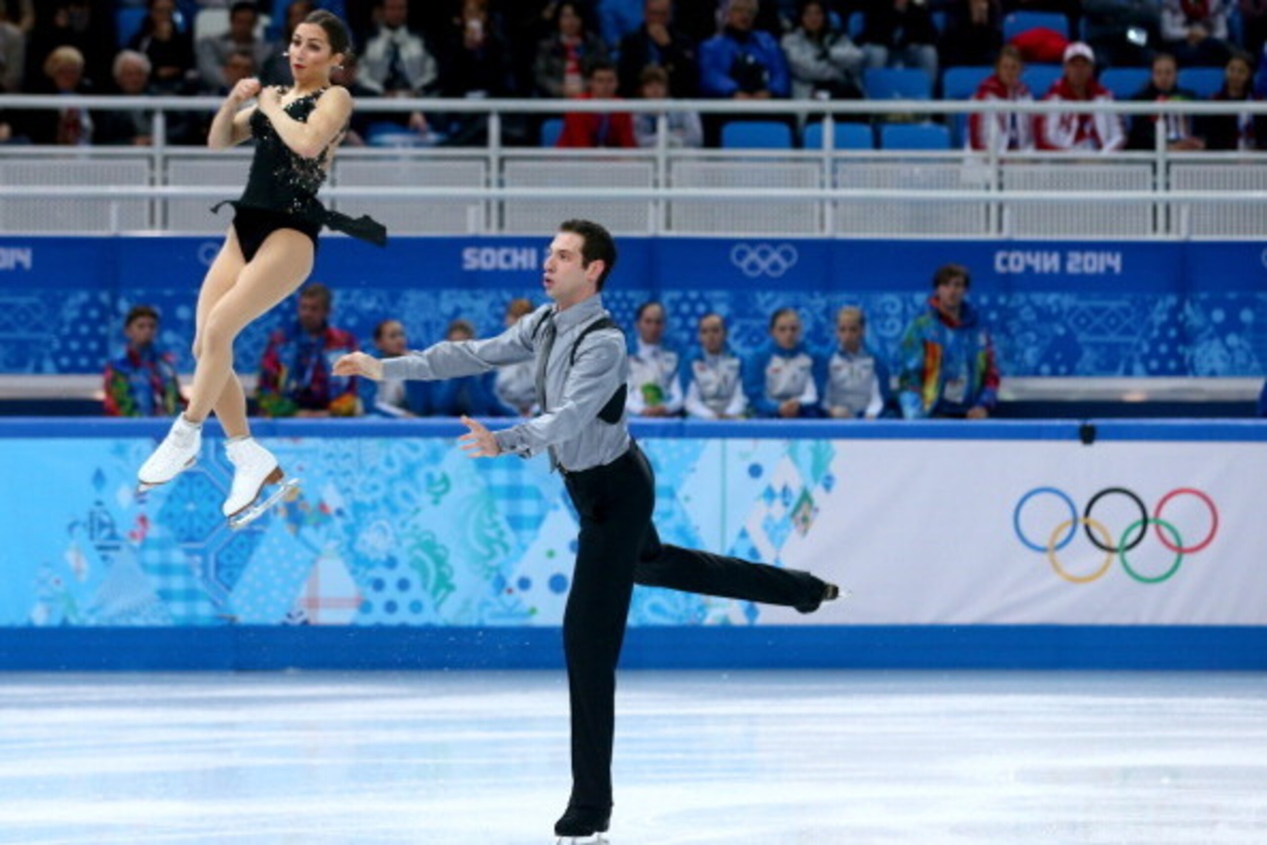 SOCHI, RUSSIA - FEBRUARY 08:  Marissa Castelli and Simon Shnapir of the United States compete in the Figure Skating Team Pairs Free Skating during day one of the Sochi 2014 Winter Olympics at Iceberg Skating Palace on February 8, 2014 in Sochi, Russia.  (
