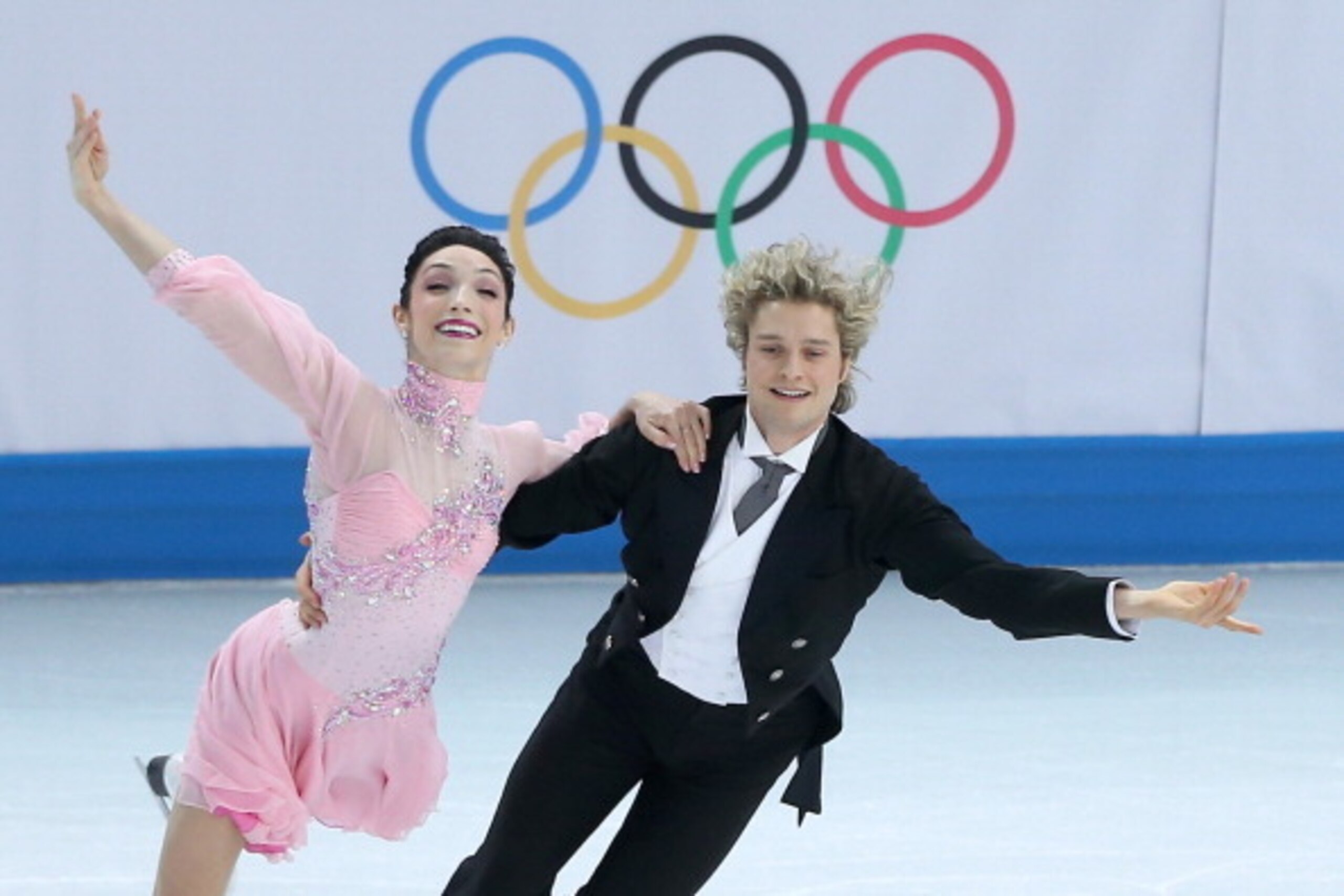 SOCHI, RUSSIA - FEBRUARY 08:  Meryl Davis and Charlie White of the United States compete in the Figure Skating Team Ice Dance - Short Dance during day one of the Sochi 2014 Winter Olympics at Iceberg Skating Palace on February 8, 2014 in Sochi, Russia.  (