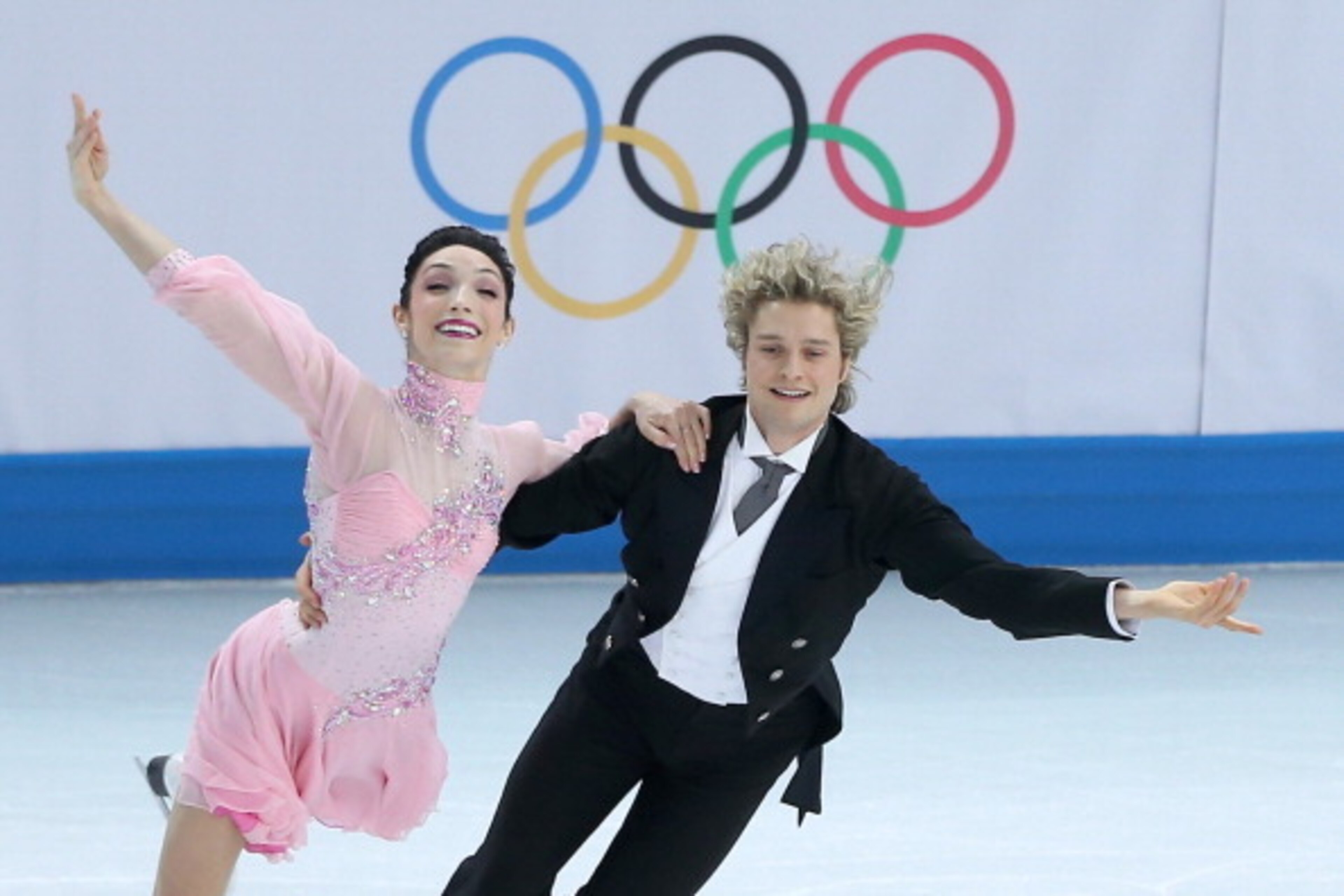 SOCHI, RUSSIA - FEBRUARY 08:  Meryl Davis and Charlie White of the United States compete in the Figure Skating Team Ice Dance - Short Dance during day one of the Sochi 2014 Winter Olympics at Iceberg Skating Palace on February 8, 2014 in Sochi, Russia.  (