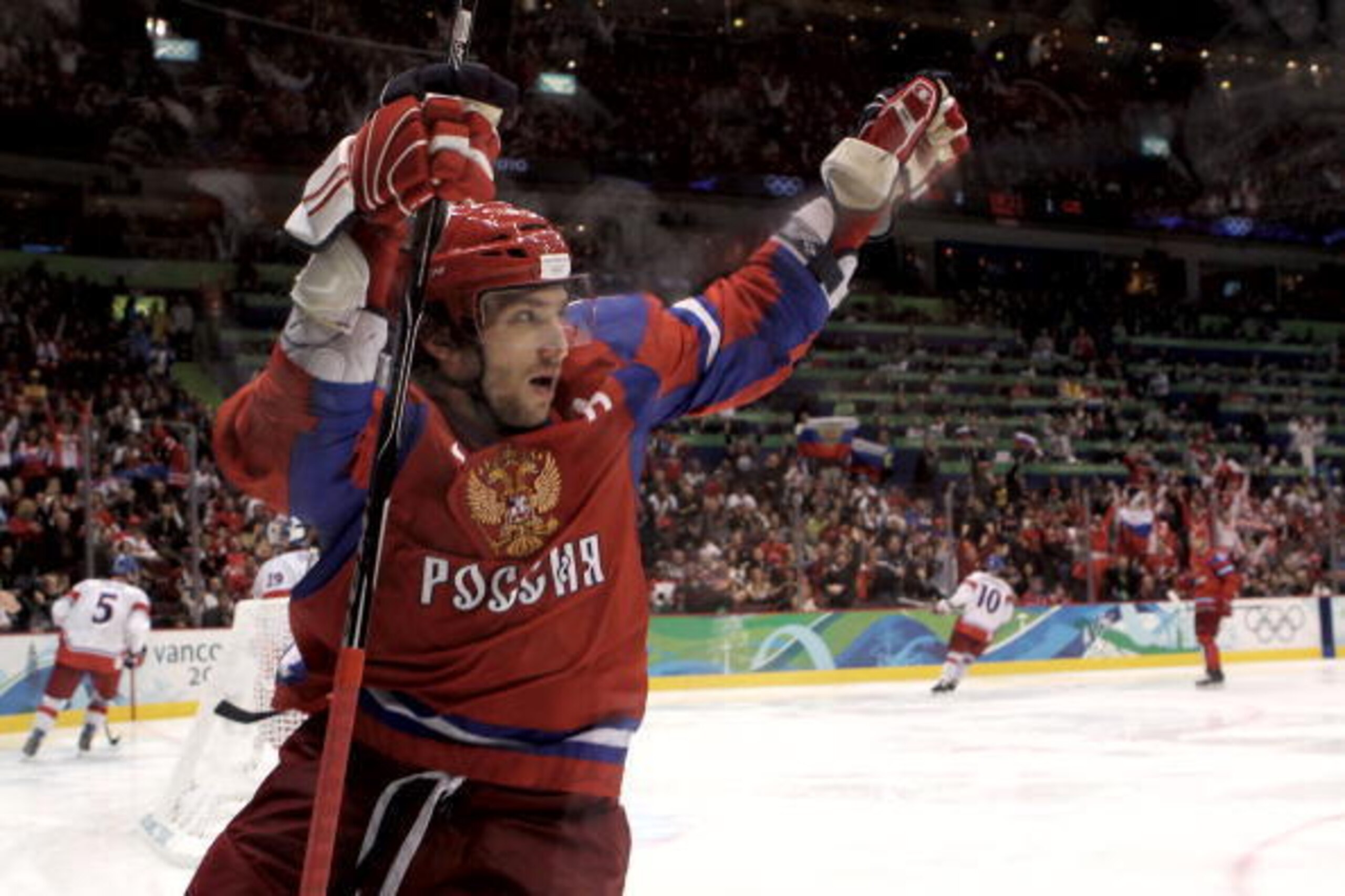 VANCOUVER, BC - FEBRUARY 21:  Alexander Ovechkin of Russian Federation celebrates after Evgeni Malkin scored a third period goal during the ice hockey men's preliminary game between Russia and Czech Republic on day 10 of the Vancouver 2010 Winter Olympics