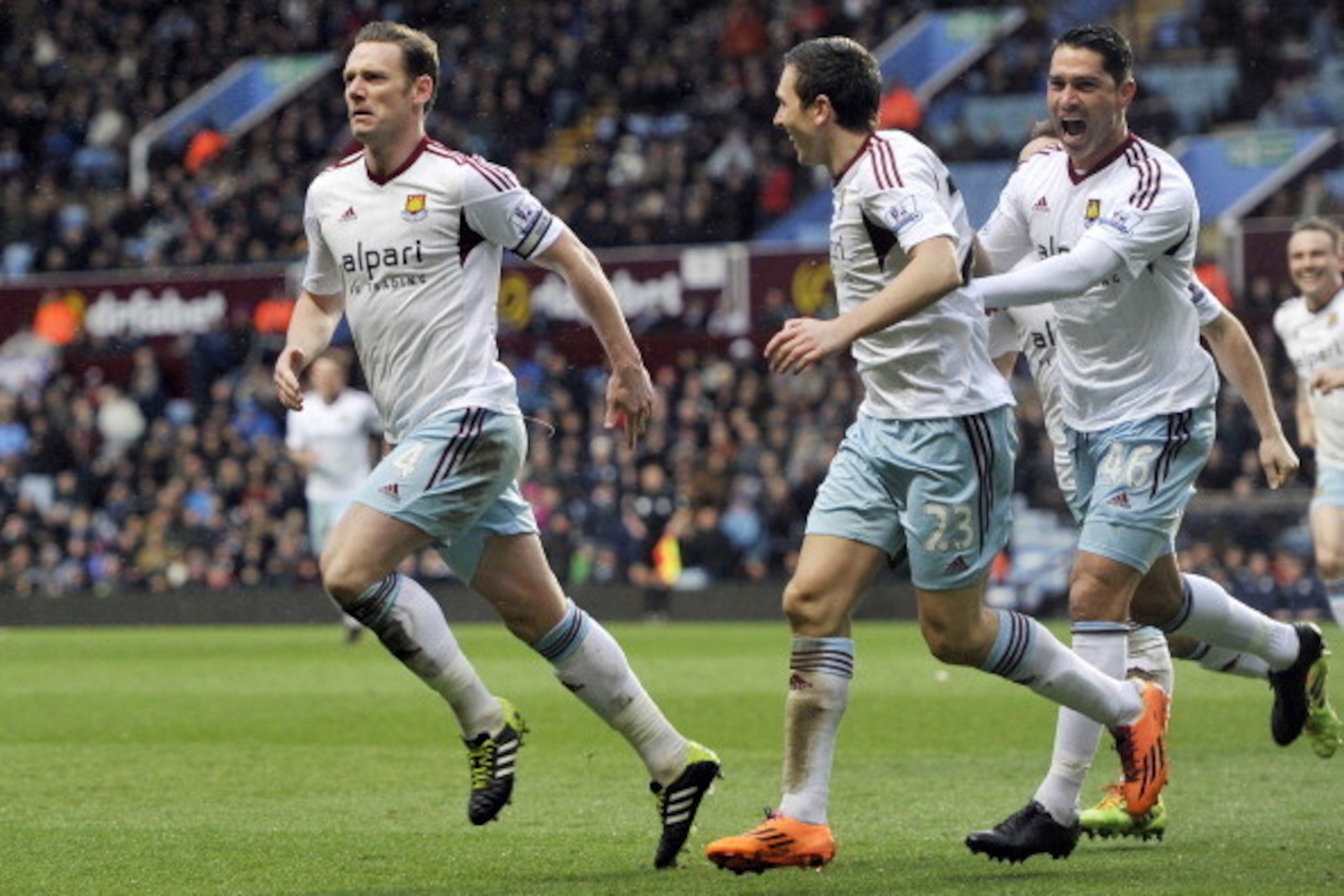 BIRMINGHAM, ENGLAND - FEBRUARY 8:  Kevin Nolan (L) of West Ham United celebrates after he scores the second goal of the game for his side during the Barclays Premier League match between Aston Villa and West Ham United at Villa Park on February 8, 2014 in