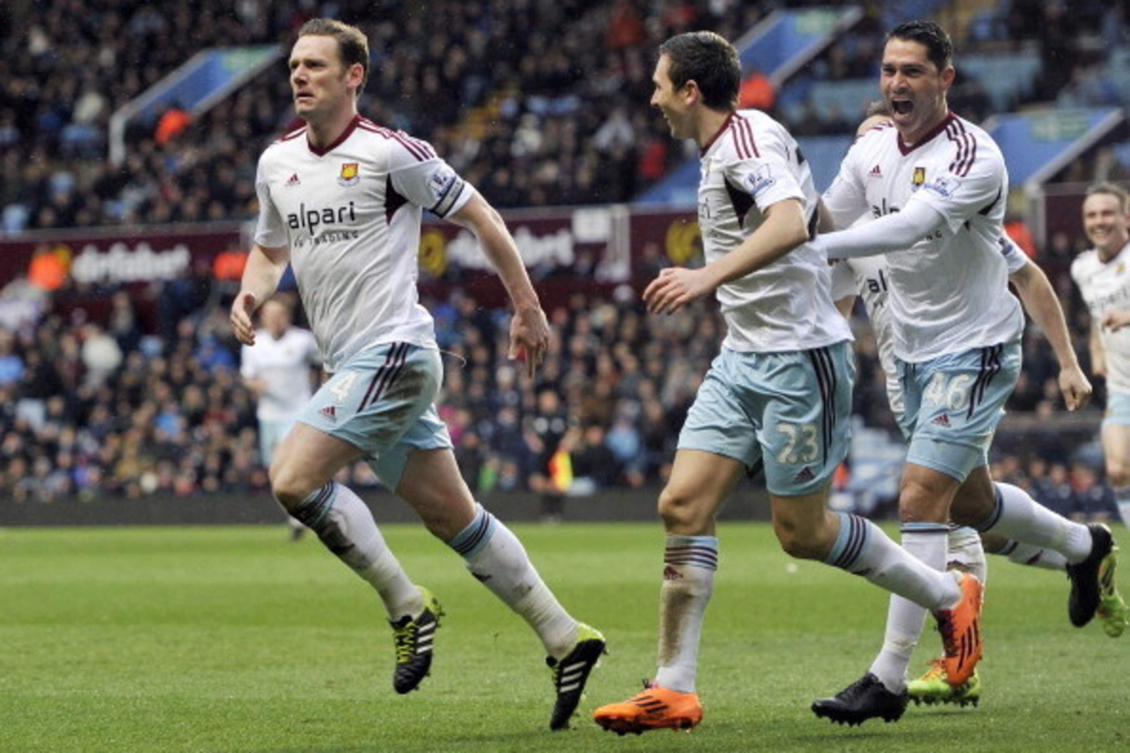 BIRMINGHAM, ENGLAND - FEBRUARY 8:  Kevin Nolan (L) of West Ham United celebrates after he scores the second goal of the game for his side during the Barclays Premier League match between Aston Villa and West Ham United at Villa Park on February 8, 2014 in