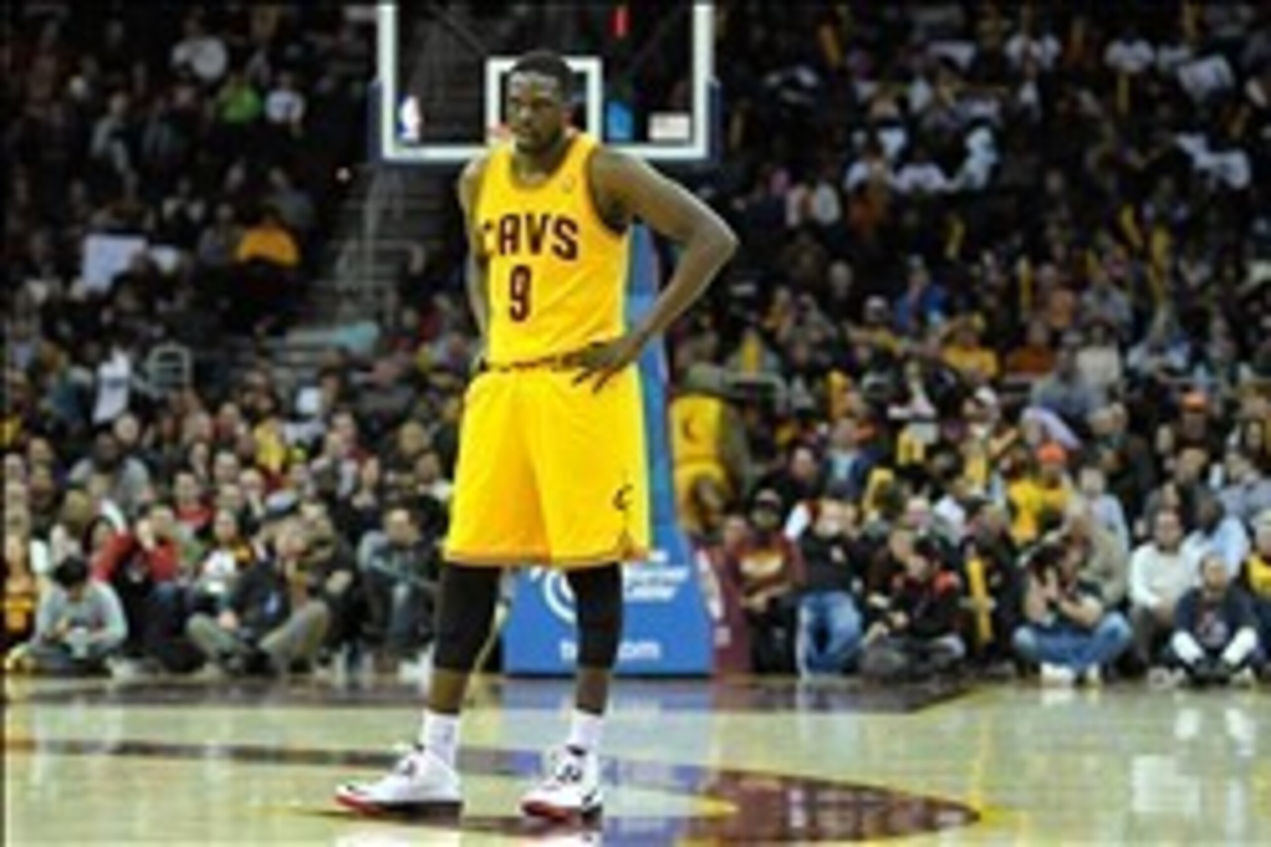 Jan 26, 2014; Cleveland, OH, USA; Cleveland Cavaliers small forward Luol Deng (9) reacts in the fourth quarter against the Phoenix Suns at Quicken Loans Arena. Mandatory Credit: David Richard-USA TODAY Sports