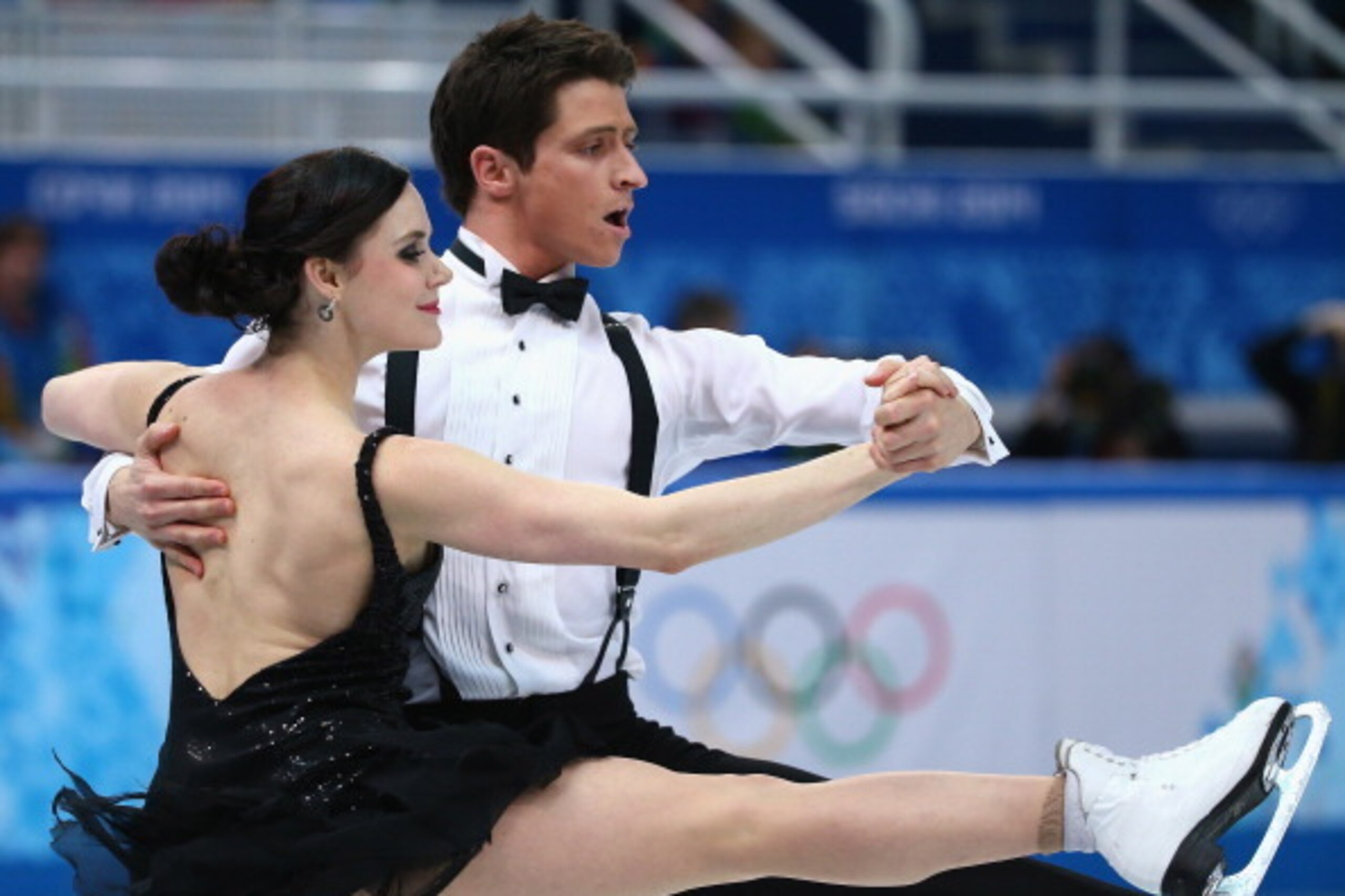 SOCHI, RUSSIA - FEBRUARY 08: Tessa Virtue and Scott Moir of Canada compete in the Figure Skating Team Ice Dance - Short Dance during day one of the Sochi 2014 Winter Olympics at Iceberg Skating Palace on February 8, 2014 in Sochi, Russia. (Photo by Robe SOCHI, RUSSIA - FEBRUARY 08: Tessa Virtue and Scott Moir of Canada compete in the Figure Skating Team Ice Dance - Short Dance during day one of the Sochi 2014 Winter Olympics at Iceberg Skating Palace on February 8, 2014 in Sochi, Russia. (Photo by Robe