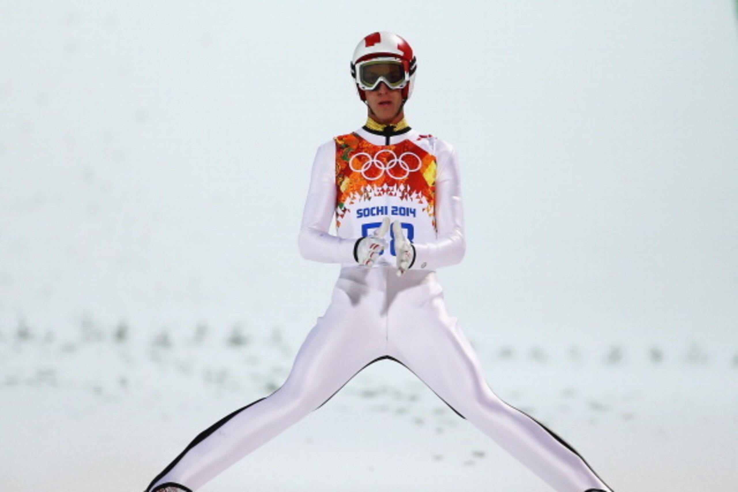 SOCHI, RUSSIA - FEBRUARY 08: Gregor Schlierenzauer of Austria jumps during the Men's Normal Hill Individual Qualification on day 1 of the Sochi 2014 Winter Olympics at the RusSki Gorki Ski Jumping Center on February 8, 2014 in Sochi, Russia.  (Photo by Al