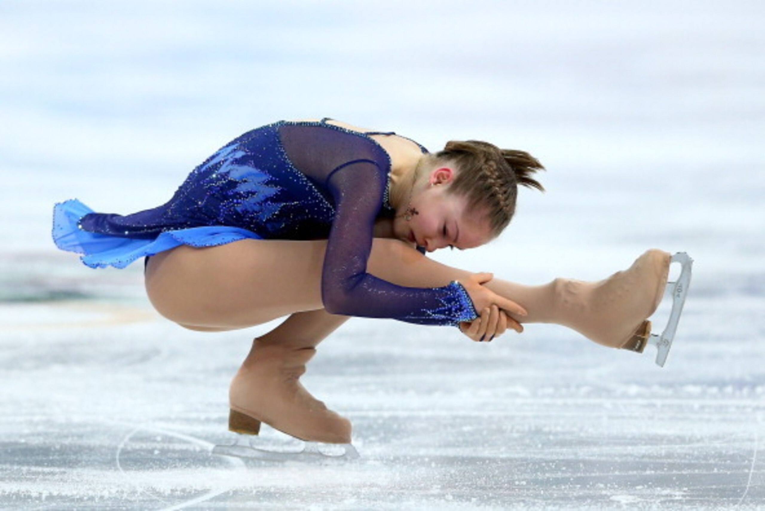 SOCHI, RUSSIA - FEBRUARY 08:  Yulia Lipnitskaya of Russia competes in the Figure Skating Team Ladies Short Program during day one of the Sochi 2014 Winter Olympics at Iceberg Skating Palace on February 8, 2014 in Sochi, Russia.  (Photo by Streeter Lecka/G