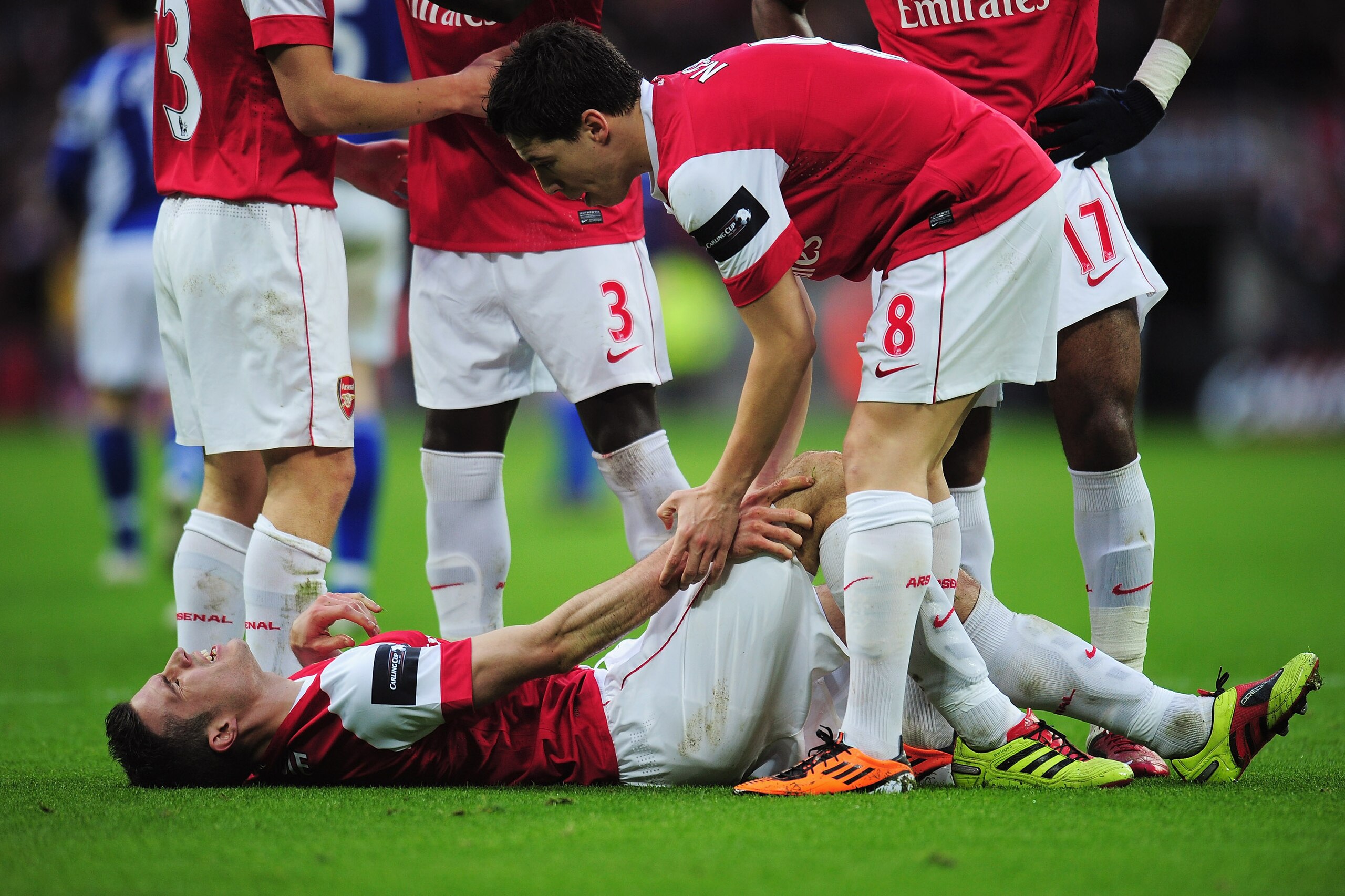 LONDON, ENGLAND - FEBRUARY 27: Robin van Persie of Arsenal lies on the ground as he is spoken to by Samir Nasri during the Carling Cup Final between Arsenal and Birmingham City at Wembley Stadium on February 27, 2011 in London, England. (Photo by Shaun B LONDON, ENGLAND - FEBRUARY 27: Robin van Persie of Arsenal lies on the ground as he is spoken to by Samir Nasri during the Carling Cup Final between Arsenal and Birmingham City at Wembley Stadium on February 27, 2011 in London, England. (Photo by Shaun B