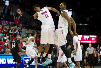 DALLAS, TX - FEBRUARY 8: Crandall Head #13 and Markus Kennedy #5 of the SMU Mustangs celebrate during a timeout against the Cincinnati Bearcats on February 8, 2014 at Moody Coliseum in Dallas, Texas.  (Photo by Cooper Neill/Getty Images)