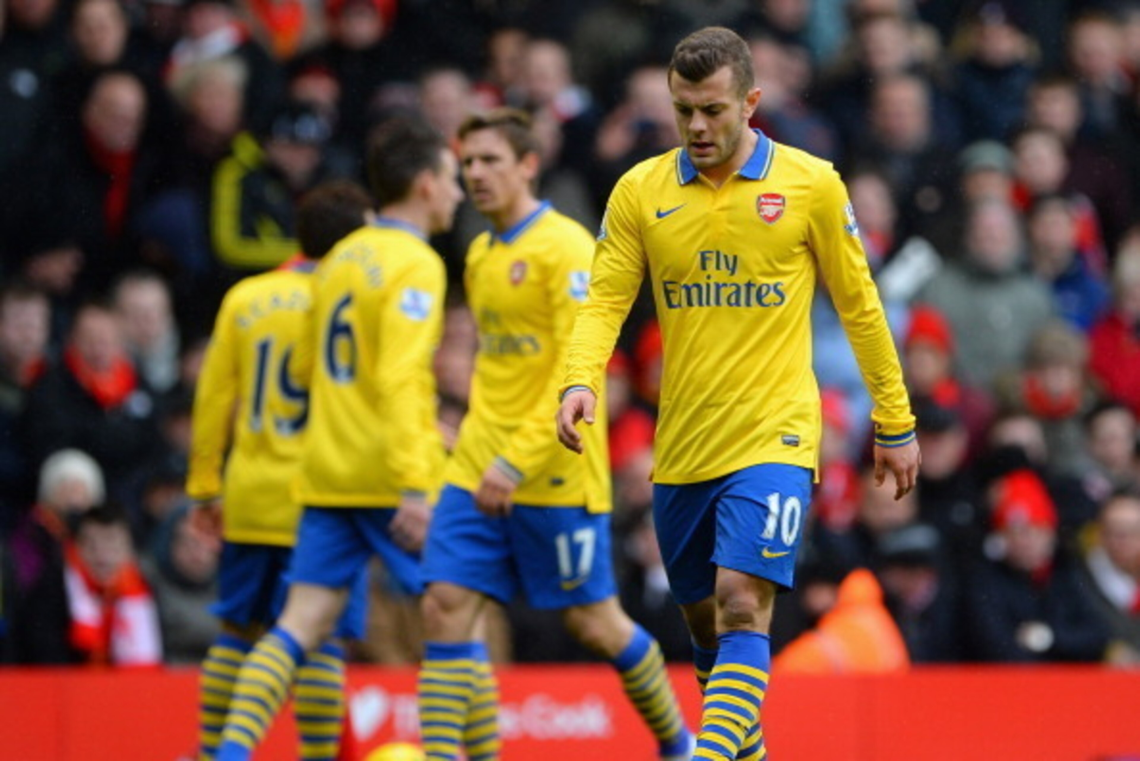 LIVERPOOL, ENGLAND - FEBRUARY 08:  Jack Wilshere of Arsenal looks dejected during the Barclays Premier League match between Liverpool and Arsenal at Anfield on February 8, 2014 in Liverpool, England.  (Photo by Michael Regan/Getty Images)