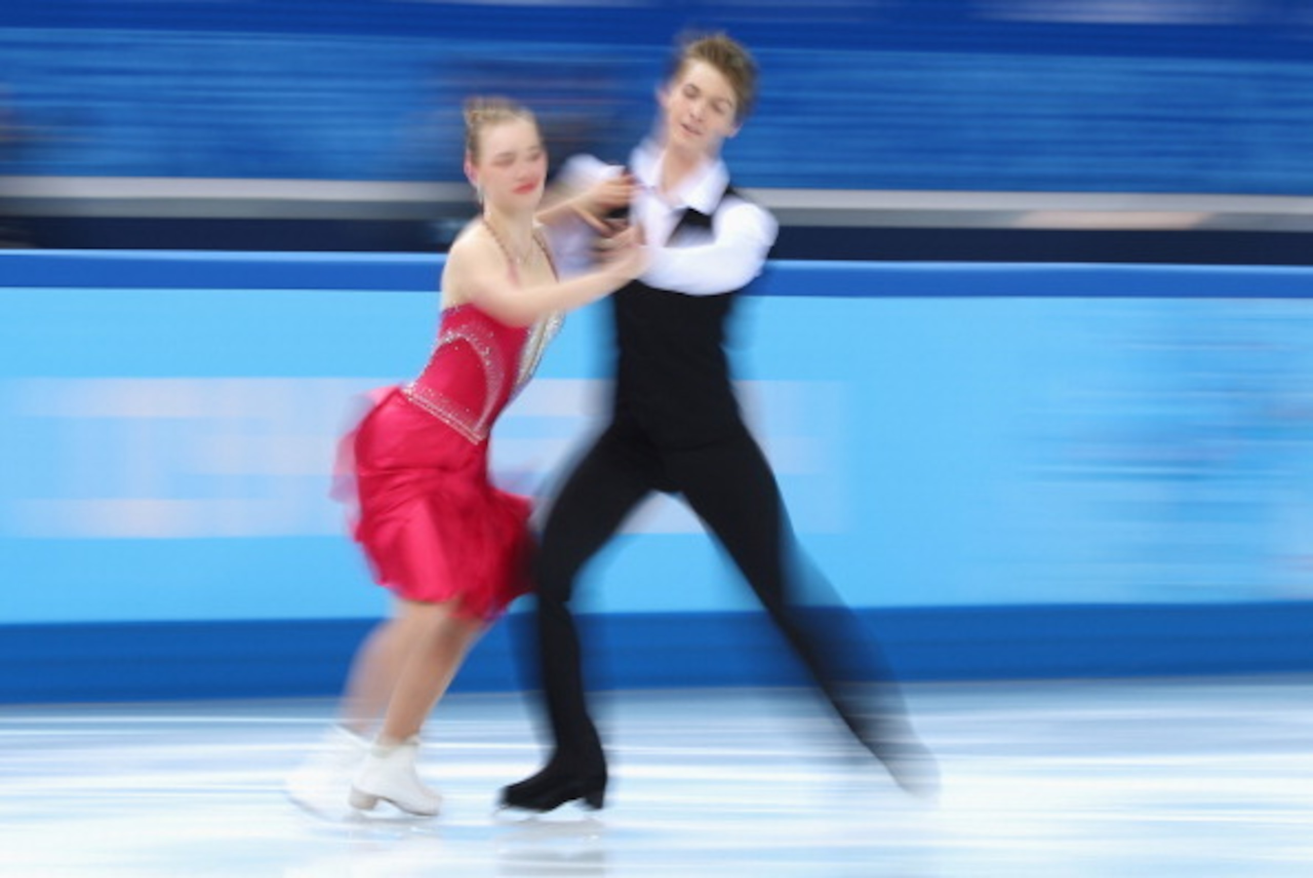 SOCHI, RUSSIA - FEBRUARY 08: Siobhan Heekin-Canedy and Dmitri Dun of Ukraine compete in the Figure Skating Team Ice Dance - Short Dance during day one of the Sochi 2014 Winter Olympics at Iceberg Skating Palace on February 8, 2014 in Sochi, Russia.  (Phot