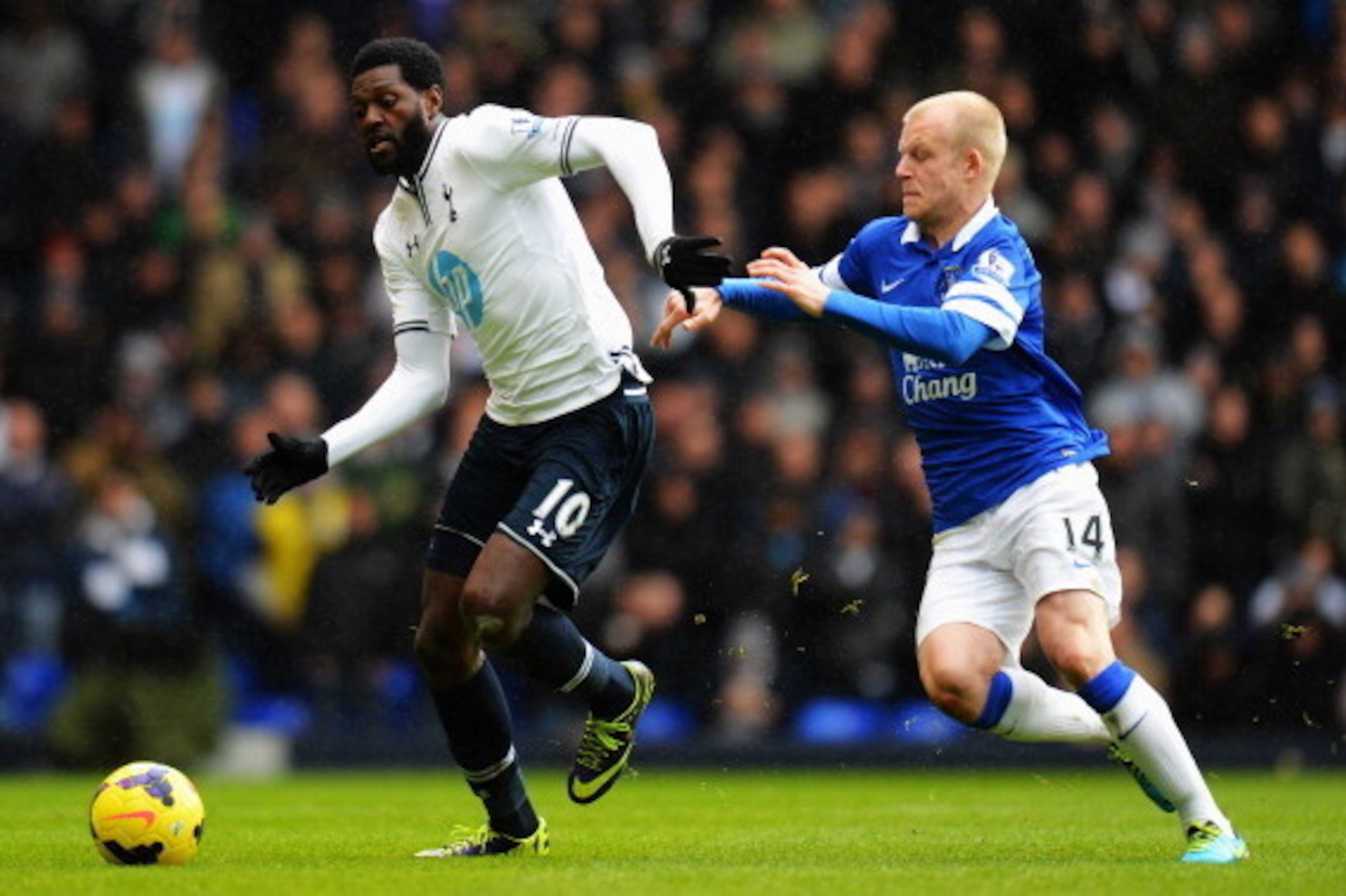 LONDON, ENGLAND - FEBRUARY 09:  Emmanuel Adebayor (L) of Tottenham Hotspur holds off the challenge of Steven Naismith (R) of Everton during the Barclays Premier League match between Tottenham Hotspur and Everton at White Hart Lane on February 9, 2014 in L