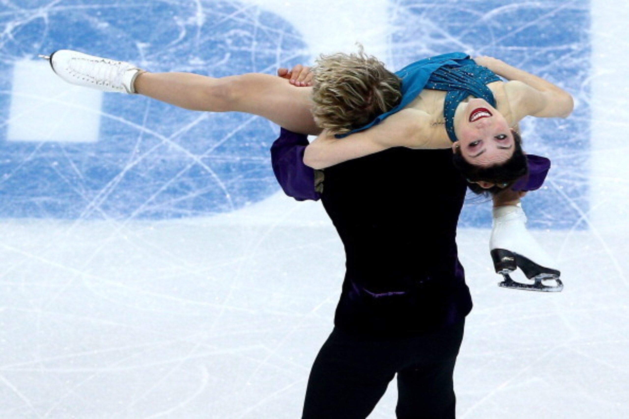 SOCHI, RUSSIA - FEBRUARY 09:  Meryl Davis and Charlie White of the United States compete in the Team Ice Dance Free Dance during day two of the Sochi 2014 Winter Olympics at Iceberg Skating Palace onon February 9, 2014 in Sochi, Russia.  (Photo by Clive M
