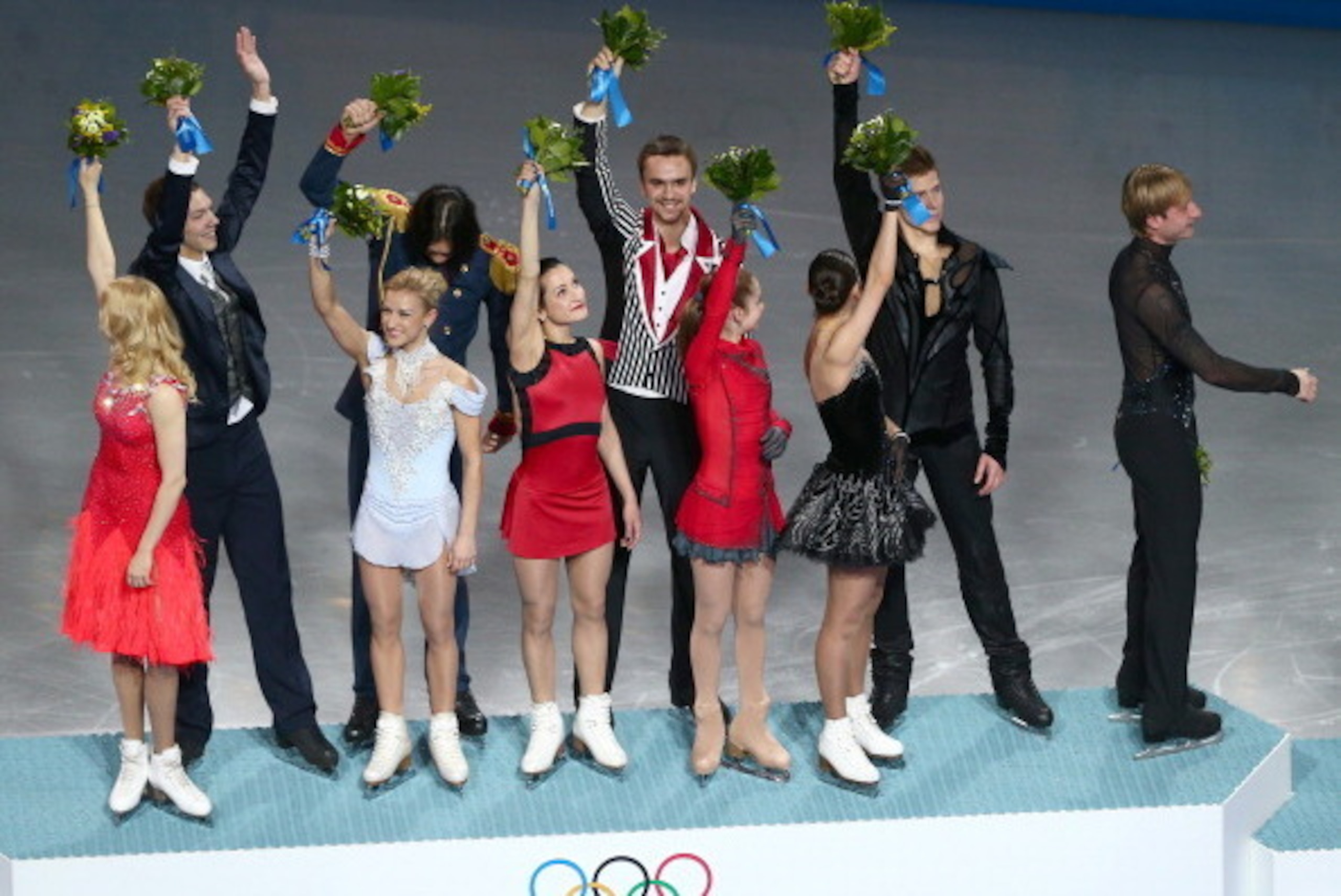 SOCHI, RUSSIA - FEBRUARY 09: (L-R) Gold medalists Ekaterina Bobrova, Dmitri Soloviev, Tatiana Volosozhar, Maxim Trankov, Ksenia Stolbova, Fedor Klimov, Yulia Lipnitskaya, Elena Ilinykh, Nikita Katsalapov and Evgeny Plyushchenko of Russia celebrate during 