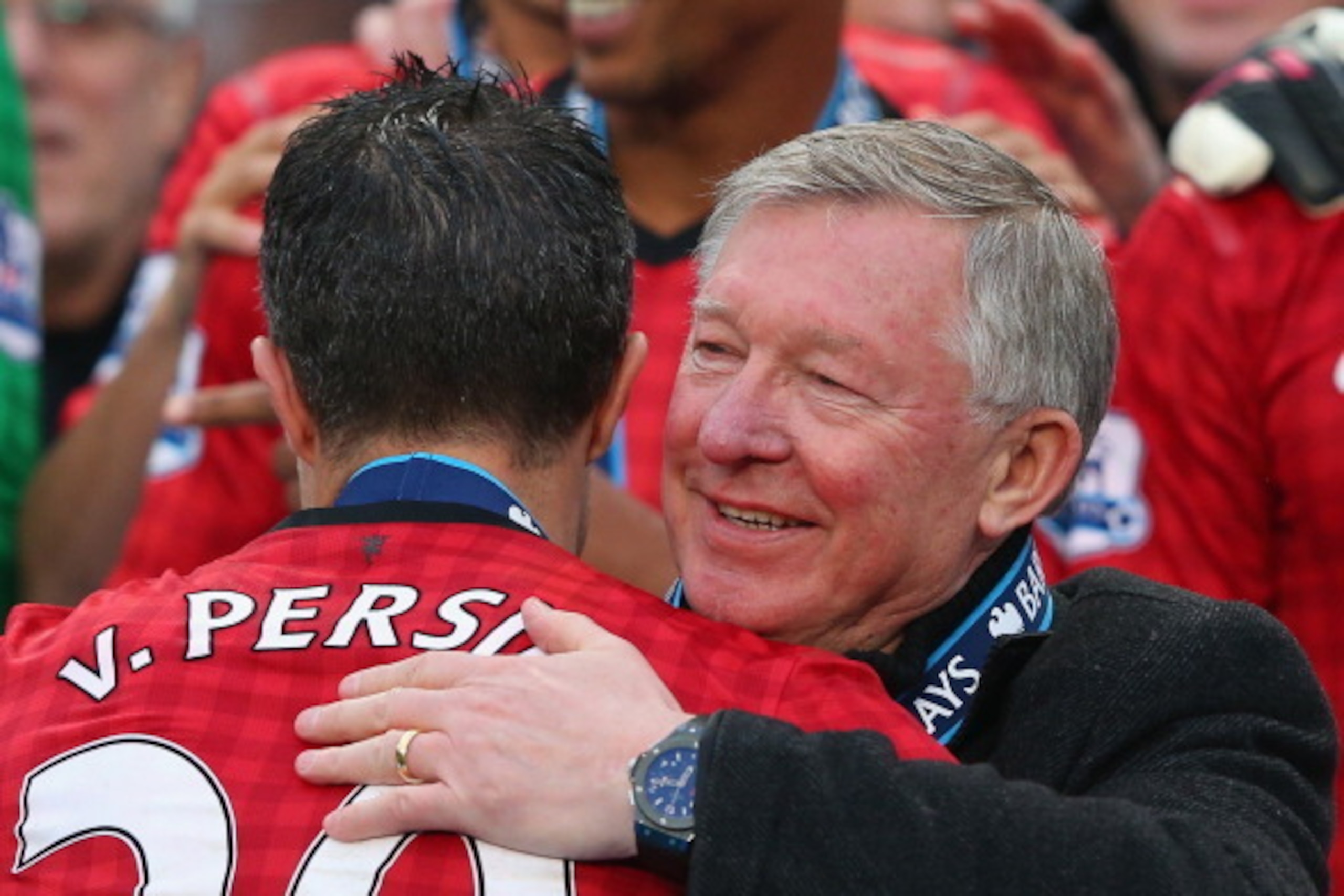 MANCHESTER, ENGLAND - MAY 12:  Manchester United Manager Sir Alex Ferguson congratulates Robin van Persie following the Barclays Premier League match between Manchester United and Swansea City at Old Trafford on May 12, 2013 in Manchester, England.  (Phot