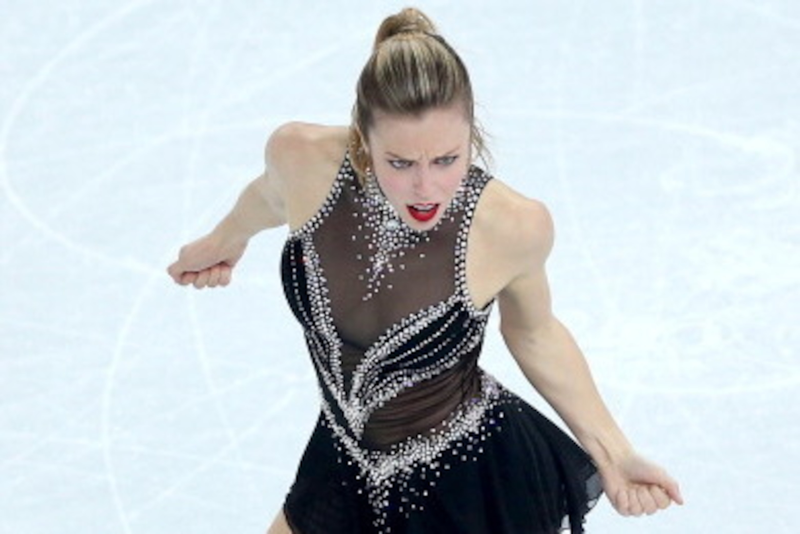 SOCHI, RUSSIA - FEBRUARY 08:  Ashley Wagner of the United States competes in the Figure Skating Team Ladies Short Program during day one of the Sochi 2014 Winter Olympics at Iceberg Skating Palace on February 8, 2014 in Sochi, Russia.  (Photo by Matthew S