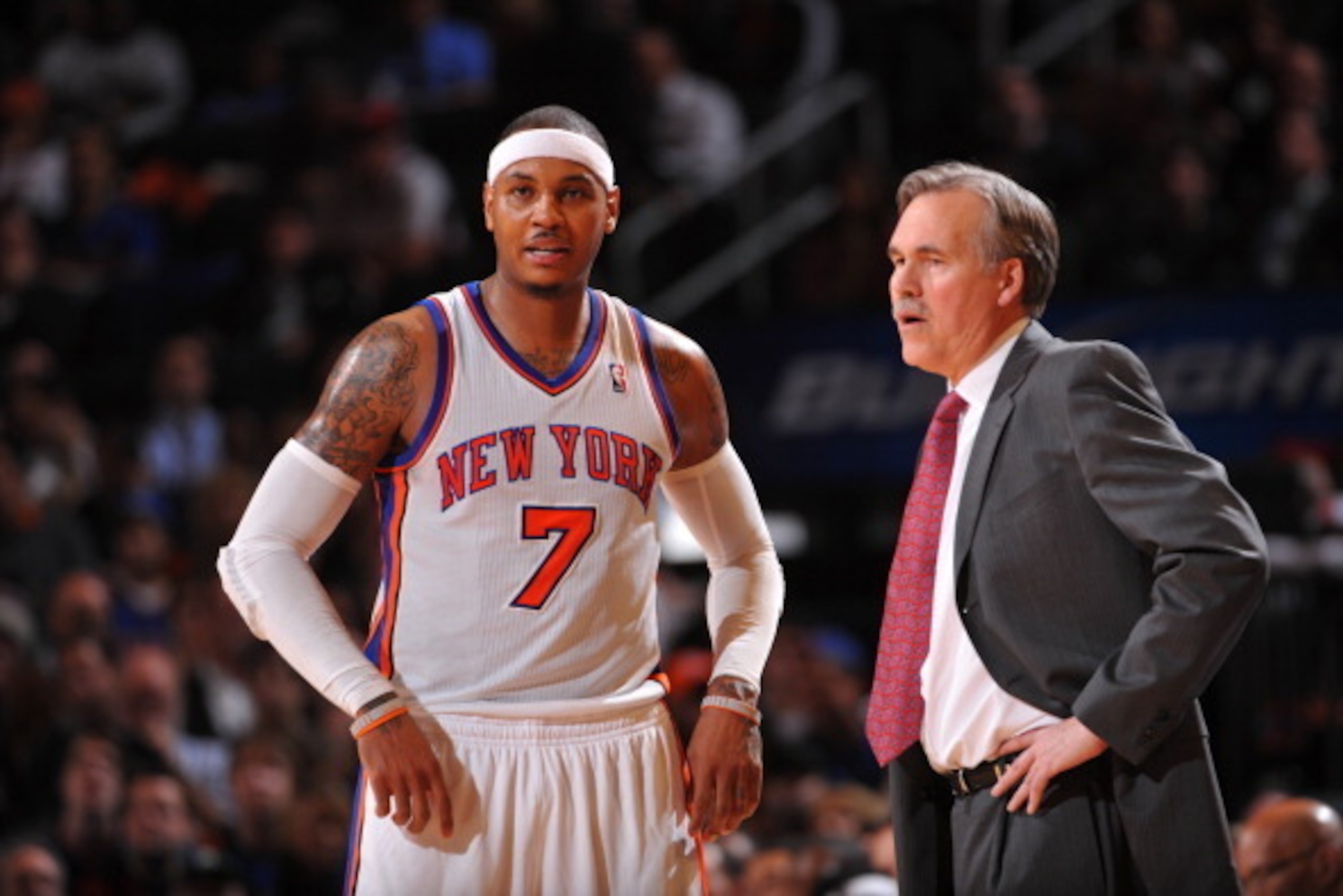 NEW YORK - JANUARY 11: Carmelo Anthony #7 of the New York Knicks talks to head coach Mike D'Antoni during the game against the Philadelphia 76ers on January 11, 2012 at Madison Square Garden in New York, New York.  NOTE TO USER: User expressly acknowledge
