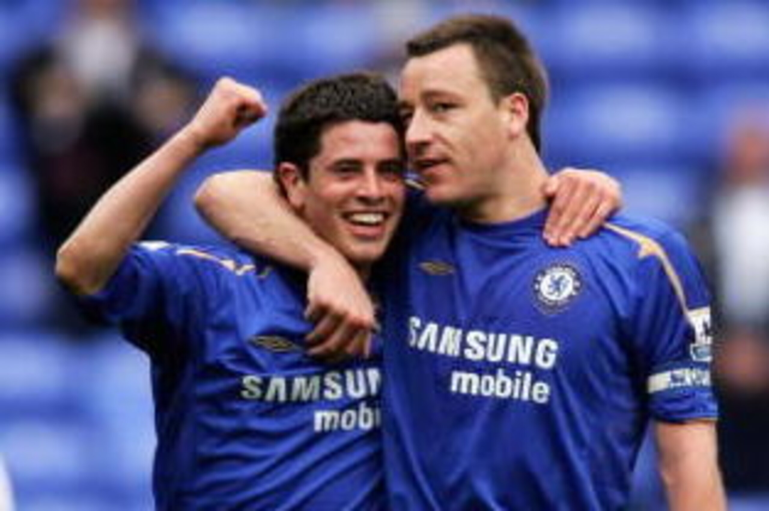 BOLTON, UNITED KINGDOM - APRIL 15: John Terry (right) and Asier Del Horno (left) of Chelsea celebrate their side's 2-0 victory during the Barclays Premiership match between Bolton Wanderers and Chelsea at the Reebok Stadium on April 15, 2006 in Bolton, En BOLTON, UNITED KINGDOM - APRIL 15: John Terry (right) and Asier Del Horno (left) of Chelsea celebrate their side's 2-0 victory during the Barclays Premiership match between Bolton Wanderers and Chelsea at the Reebok Stadium on April 15, 2006 in Bolton, En
