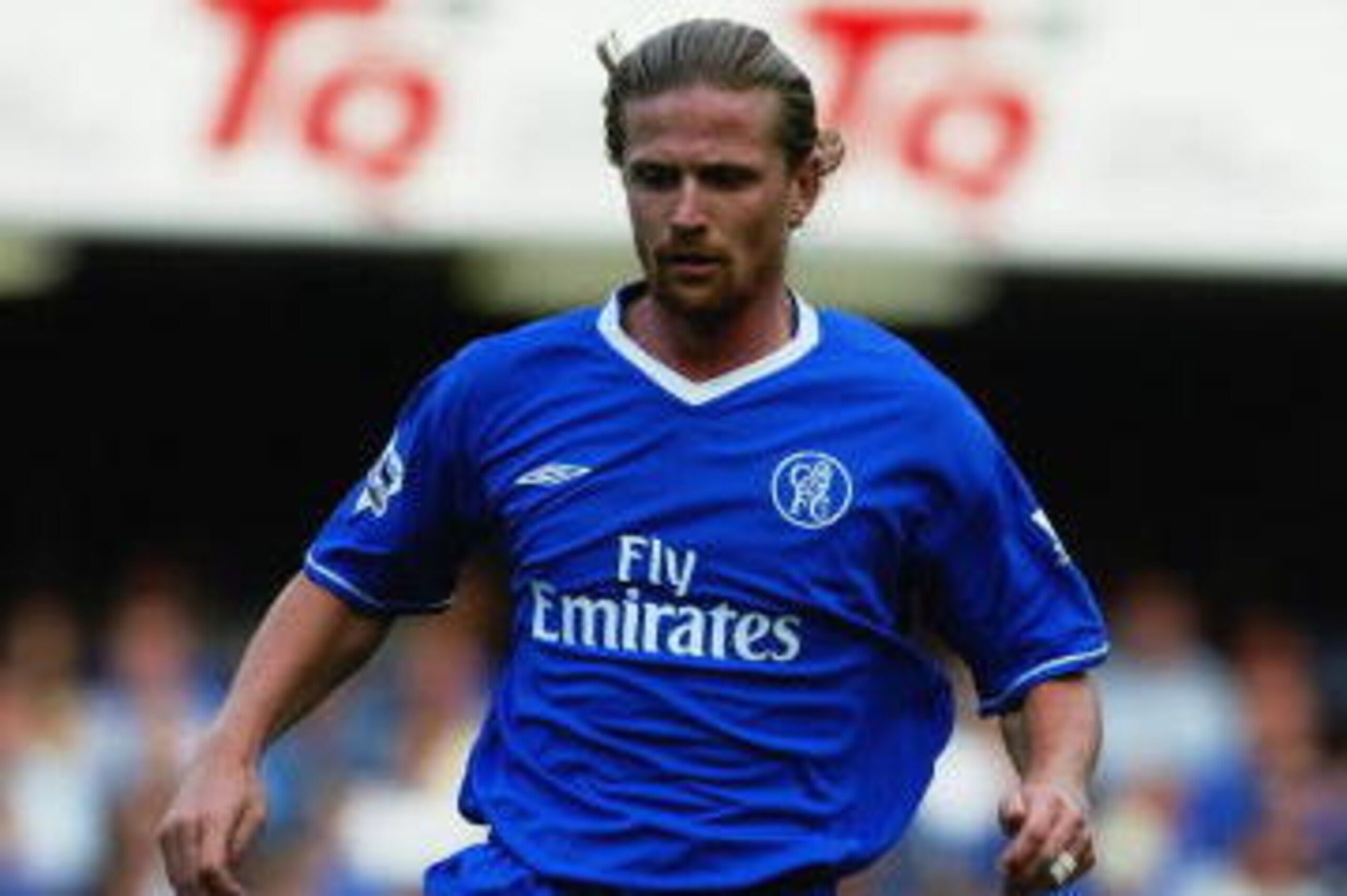 LONDON - SEPTEMBER 27: Emmanuel Petit of Chelsea runs with the ball during the FA Barclaycard Premiership match between Chelsea and Aston Villa held on September 27, 2003 at Stamford Bridge, in London. Chelsea won the match 1-0. (Photo by Mike Hewitt/Get LONDON - SEPTEMBER 27: Emmanuel Petit of Chelsea runs with the ball during the FA Barclaycard Premiership match between Chelsea and Aston Villa held on September 27, 2003 at Stamford Bridge, in London. Chelsea won the match 1-0. (Photo by Mike Hewitt/Get