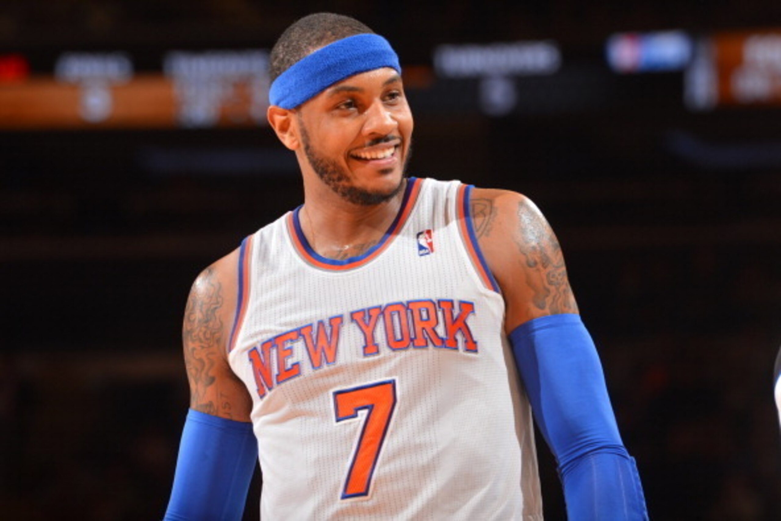 NEW YORK, NY - JANUARY 22: Carmelo Anthony #7 of the New York Knicks smiles against the Philadelphia 76ers during the game on January 22, 2014 at Madison Square Garden in New York City, New York.   NOTE TO USER: User expressly acknowledges and agrees that