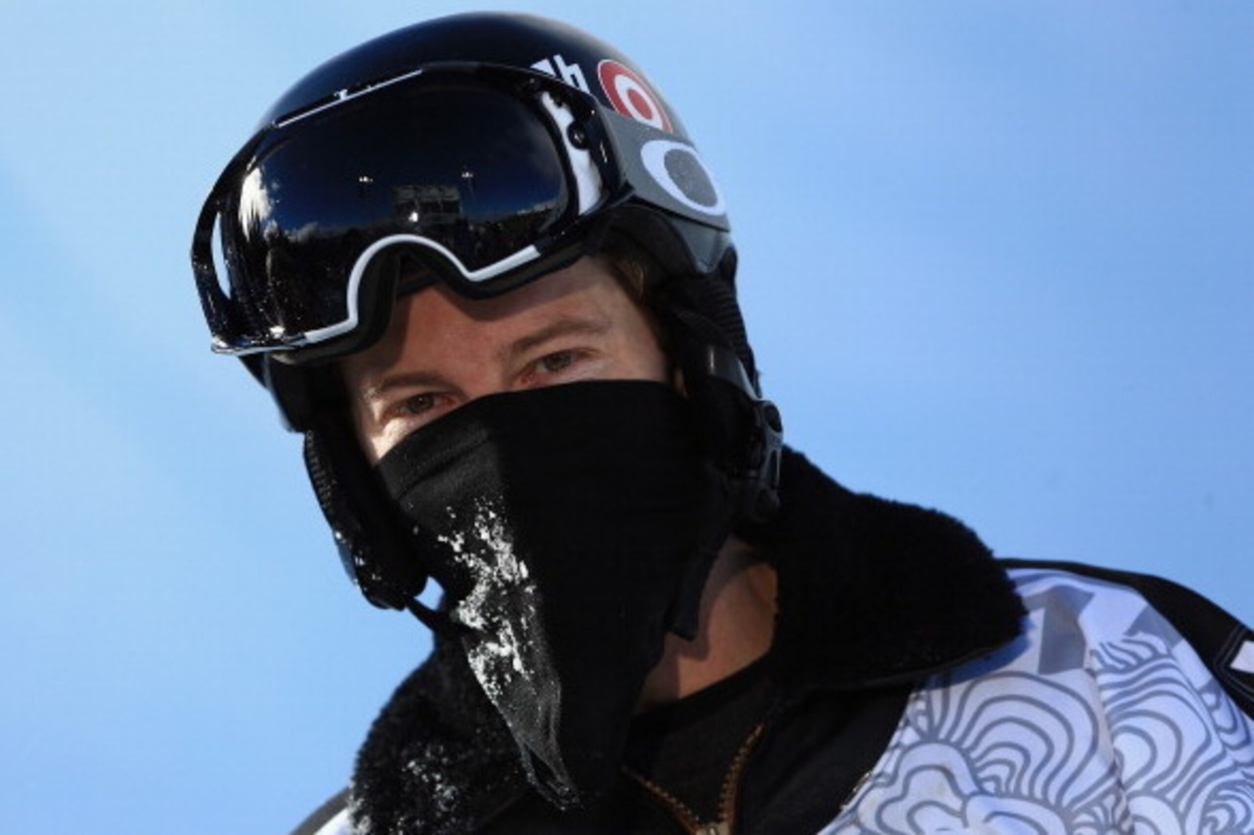 BRECKENRIDGE, CO - DECEMBER 14:  Shaun White looks on as he finished second in the men's snowboard superpipe final at the Dew Tour iON Mountain Championships on December 14, 2013 in Breckenridge, Colorado.  (Photo by Doug Pensinger/Getty Images)