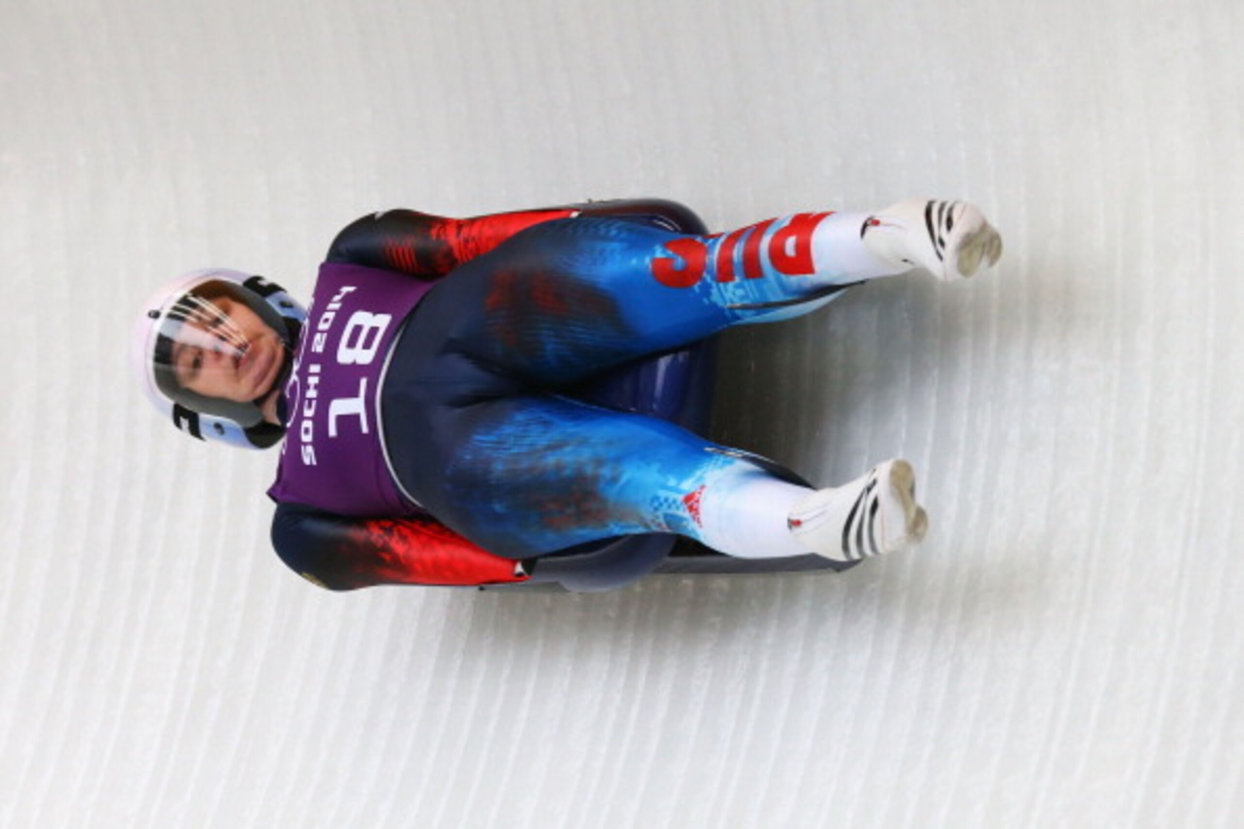 SOCHI, RUSSIA - FEBRUARY 09:  Ekaterina Baturina of Russia makes a run during a Women's Luge Singles training session on Day 2 of the Sochi 2014 Winter Olympics at the Sanki Sliding Center on February 9, 2014 in Sochi, Russia.  (Photo by Alex Livesey/Gett