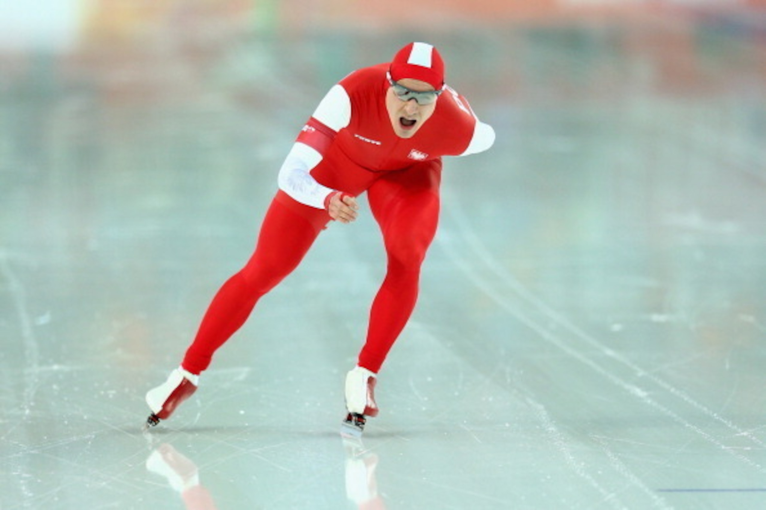 SOCHI, RUSSIA - FEBRUARY 08:  Jan Szymanski of Poland competes during the Men's 5000m Speed Skating event during day 1 of the Sochi 2014 Winter Olympics at Adler Arena Skating Center on February 8, 2014 in Sochi, Russia.  (Photo by Paul Gilham/Getty Image