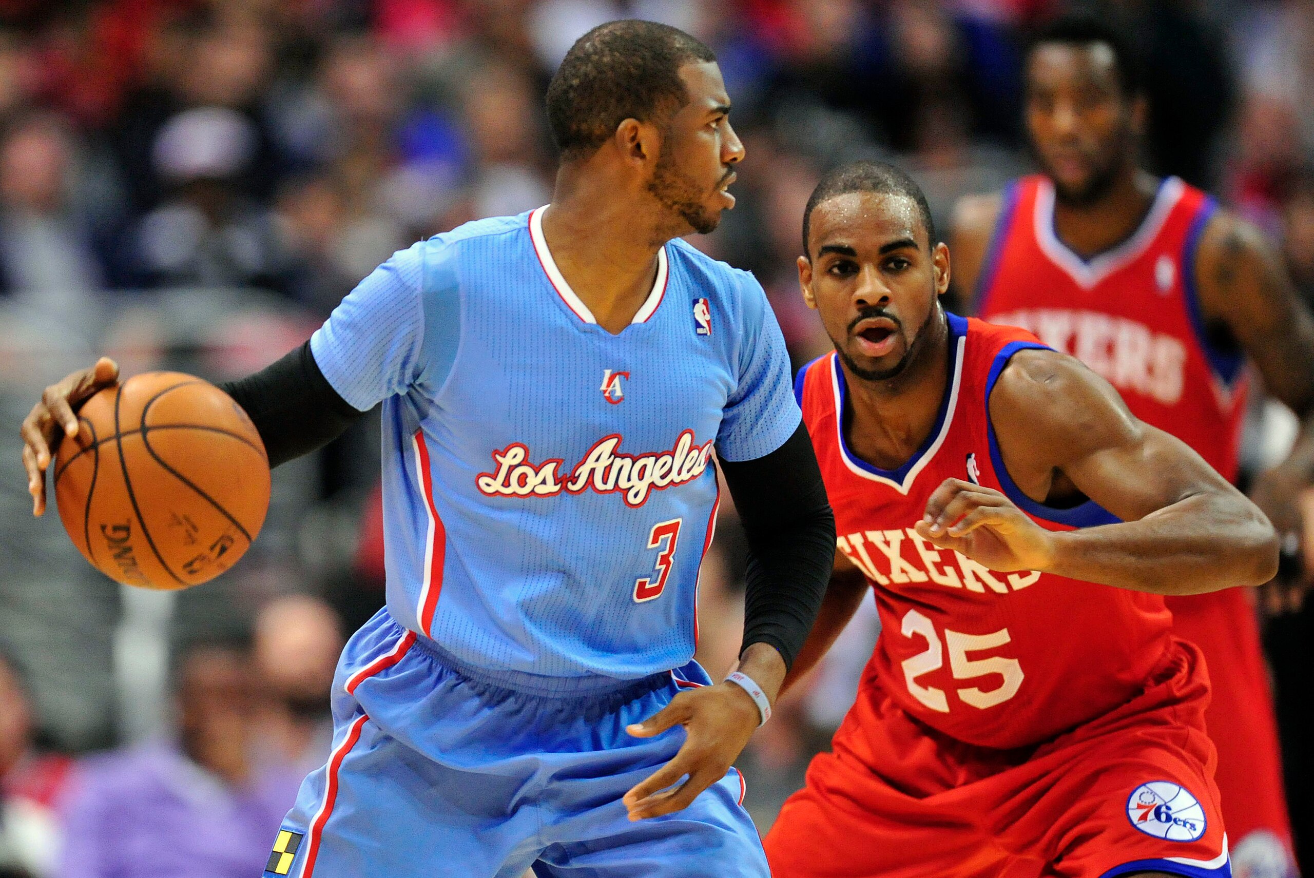 February 9, 2014; Los Angeles, CA, USA; Los Angeles Clippers point guard Chris Paul (3) moves the ball against the Philadelphia 76ers during the first half at Staples Center. Mandatory Credit: Gary A. Vasquez-USA TODAY Sports