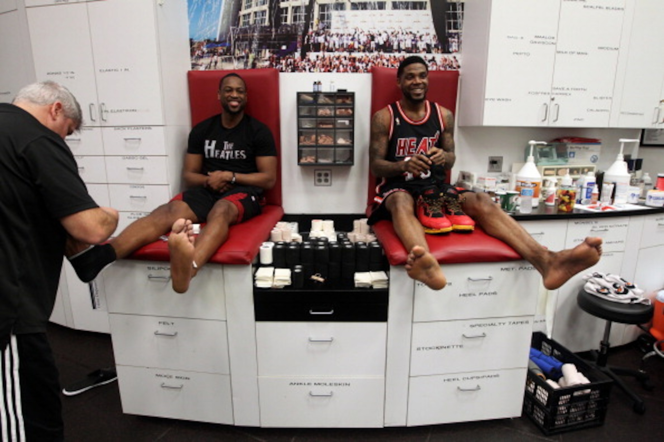 MIAMI, FL - JANUARY 26: Dwyane Wade #3 and Udonis Haslem #40 of the Miami Heat gets ready against the San Antonio Spurs at the American Airlines Arena in Miami, Florida on Jan. 26, 2014. NOTE TO USER: User expressly acknowledges and agrees that, by downlo