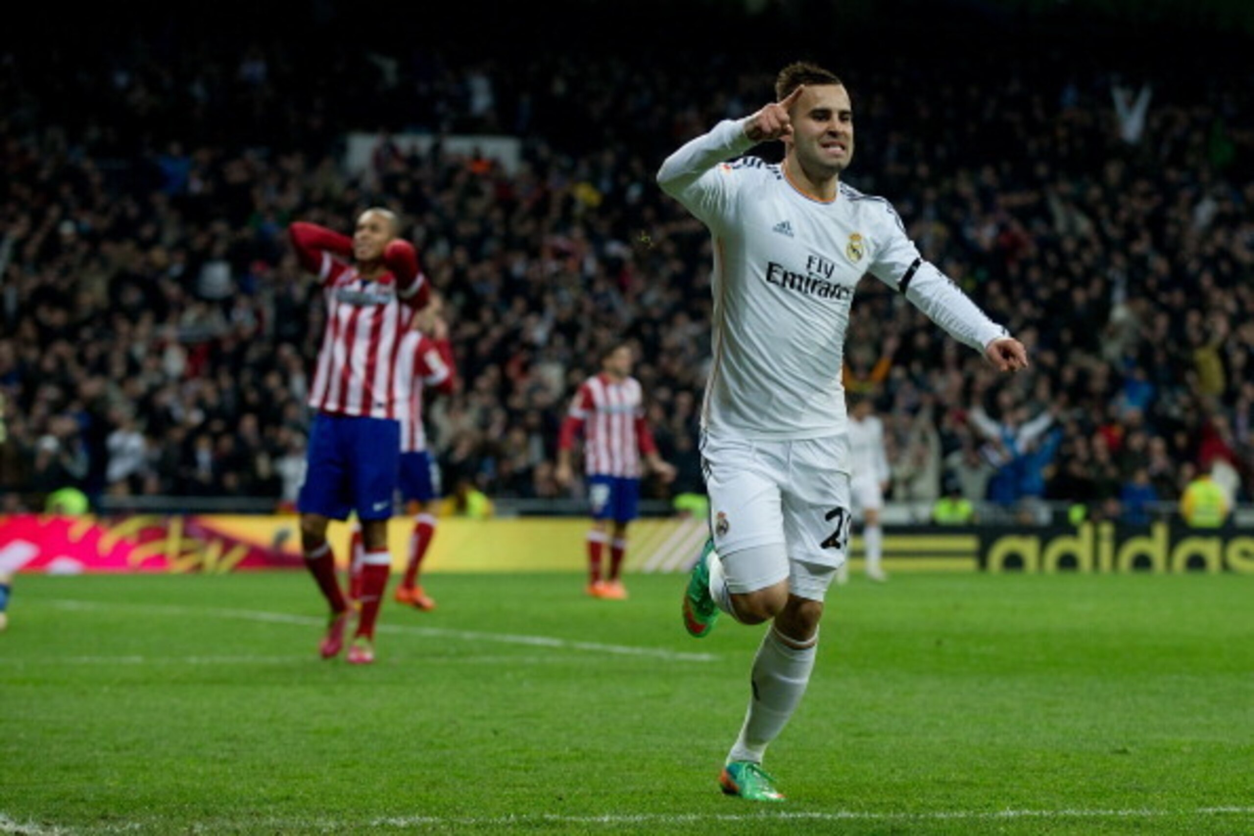 MADRID, SPAIN - FEBRUARY 05:  Jese Rodriguez of Real Madrid CF jumps celebrating scoring their second goal during the Copa del Rey semifinal first leg match between Real Madrid CF and Club Atletico Madrid at Estadio Santiago Bernabeu on February 5, 2014 i