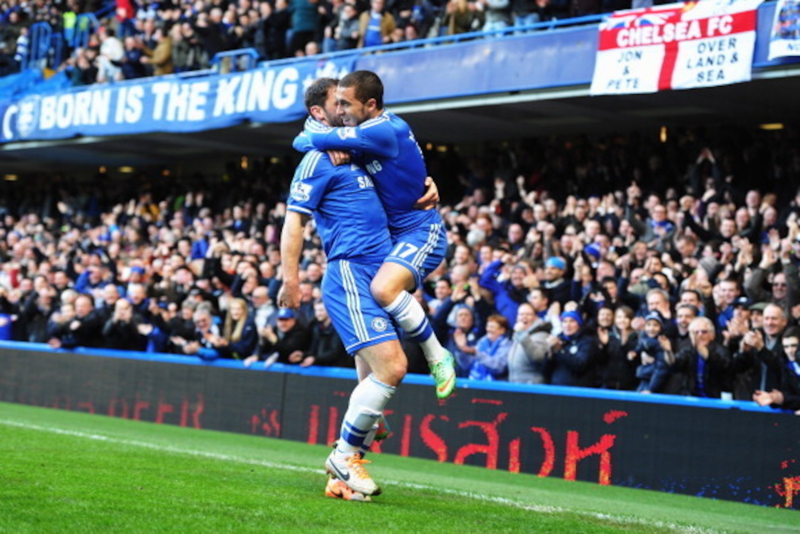 LONDON, ENGLAND - FEBRUARY 08:  Eden Hazard (R) of Chelsea celebrates with team mate Branislav Ivanovic after scoring during the Barclays Premier League match between Cheslea and Newcastle United at Stamford Bridge on February 8, 2014 in London, England. 