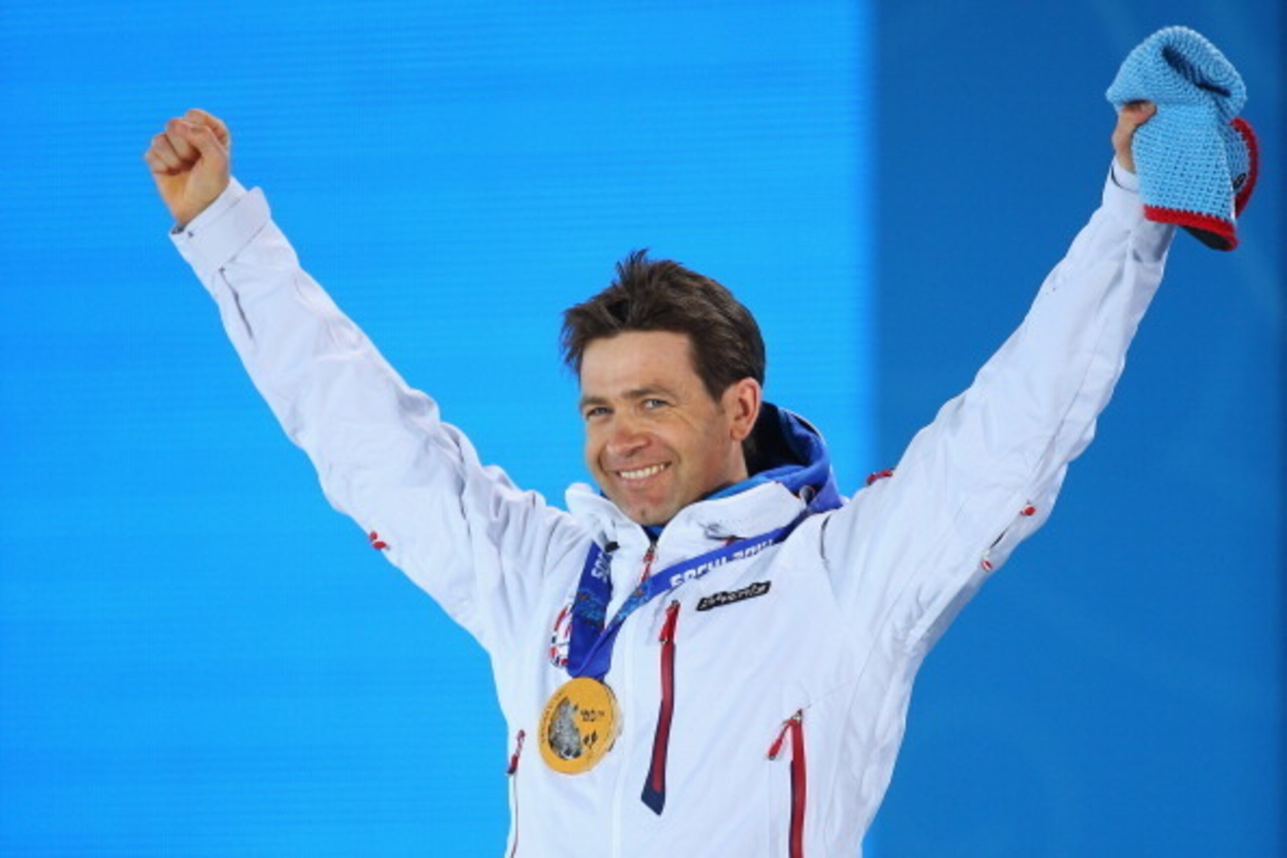 SOCHI, RUSSIA - FEBRUARY 09:  Gold medalist Ole Einar Bjoerndalen of Norway celebrates during the medal ceremony for the Men's Sprint 10 km on day 2 of the Sochi 2014 Winter Olympics at Medals Plaza on February 9, 2014 in Sochi, .  (Photo by Quinn Rooney/