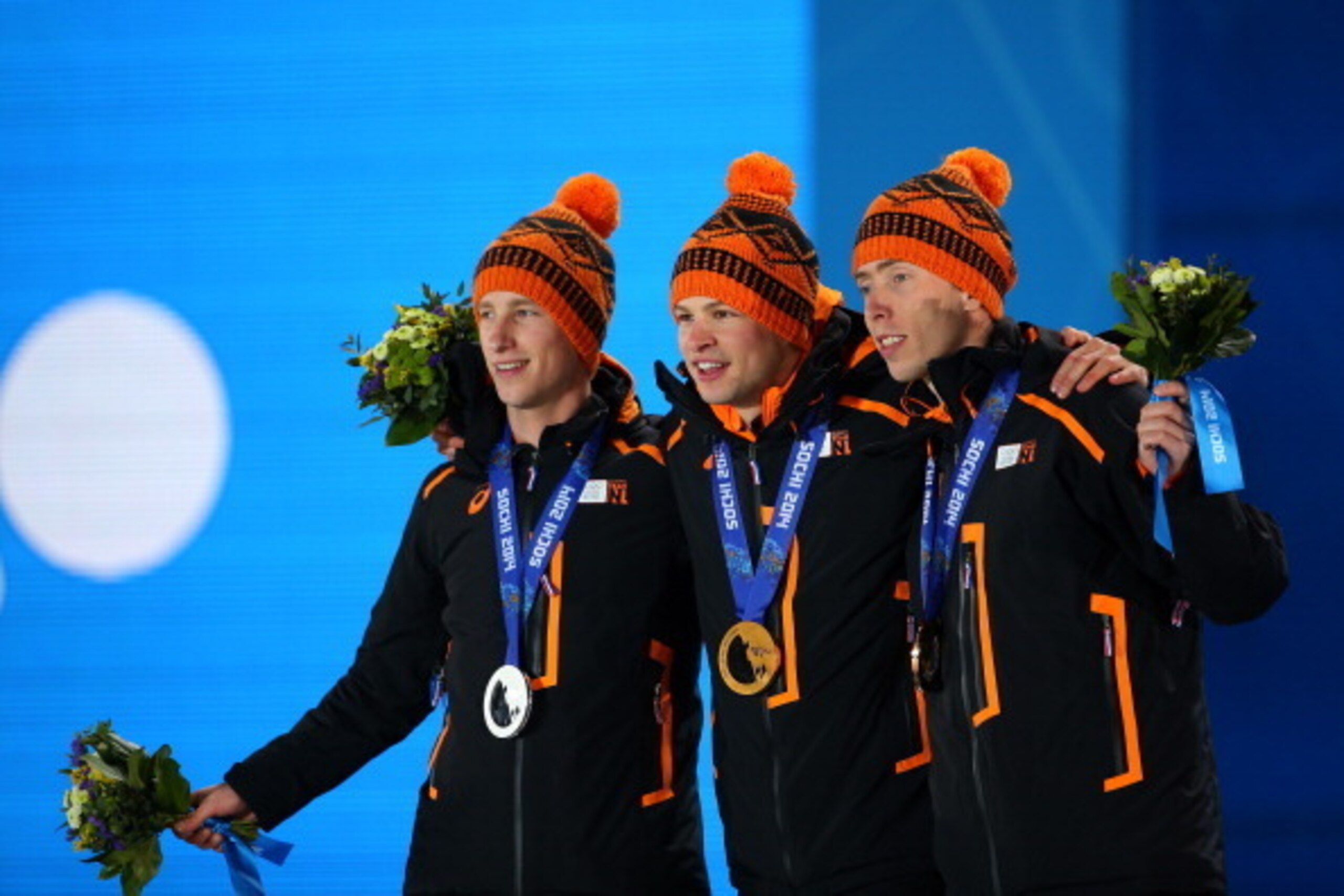 SOCHI, RUSSIA - FEBRUARY 09:  (L-R) Silver medalist Jan Blokhuijsen of the Netherlands, gold medalist Sven Kramer of the Netherlands and bronze medalist Jorrit Bergsma of the Netherlands during the medal ceremony for the Men's 5000m Speed Skating on day 2