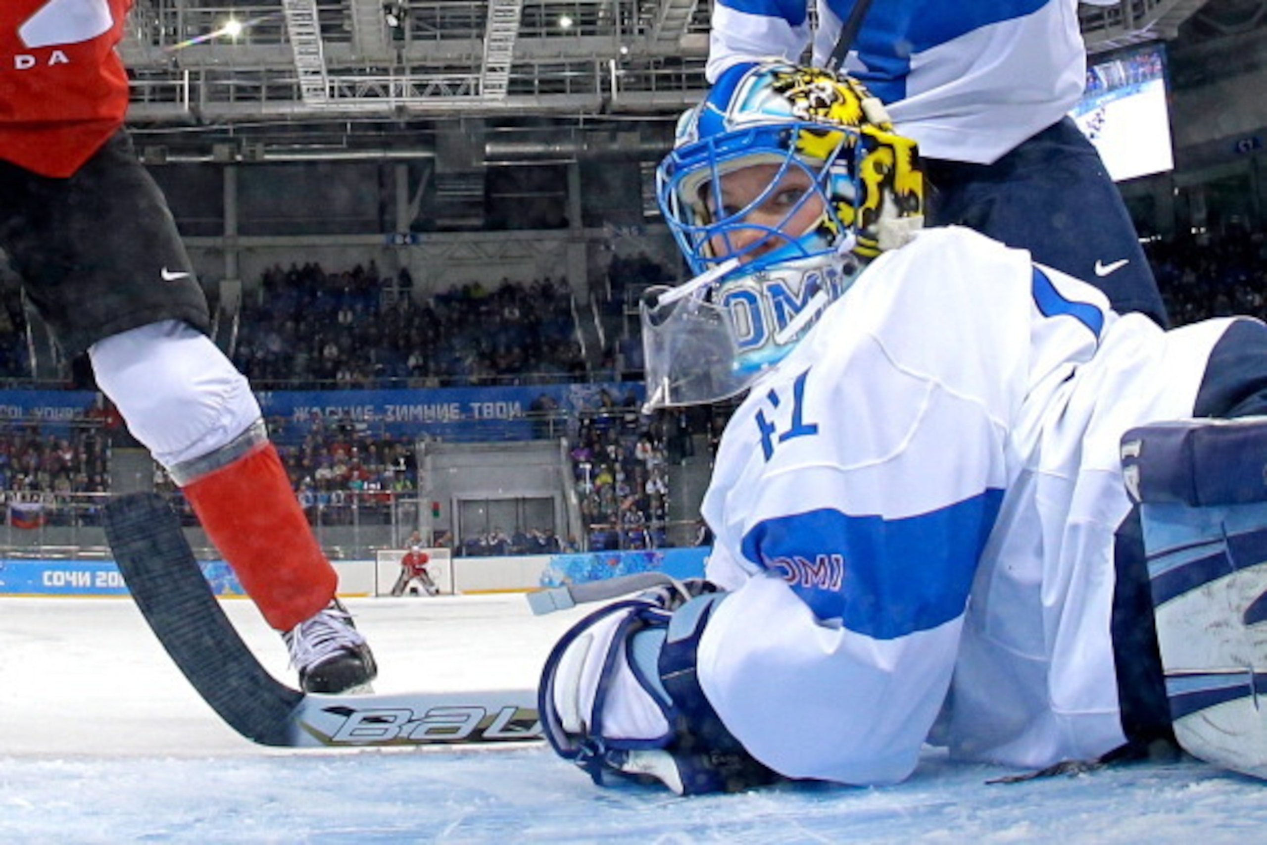 SOCHI, RUSSIA - FEBRUARY 10:  Noora Raty #41 of Finland looks back into the net after a save against Canada during the Women's Ice Hockey Preliminary Round Group A game on day three of the Sochi 2014 Winter Olympics at Shayba Arena on February 10, 2014 in