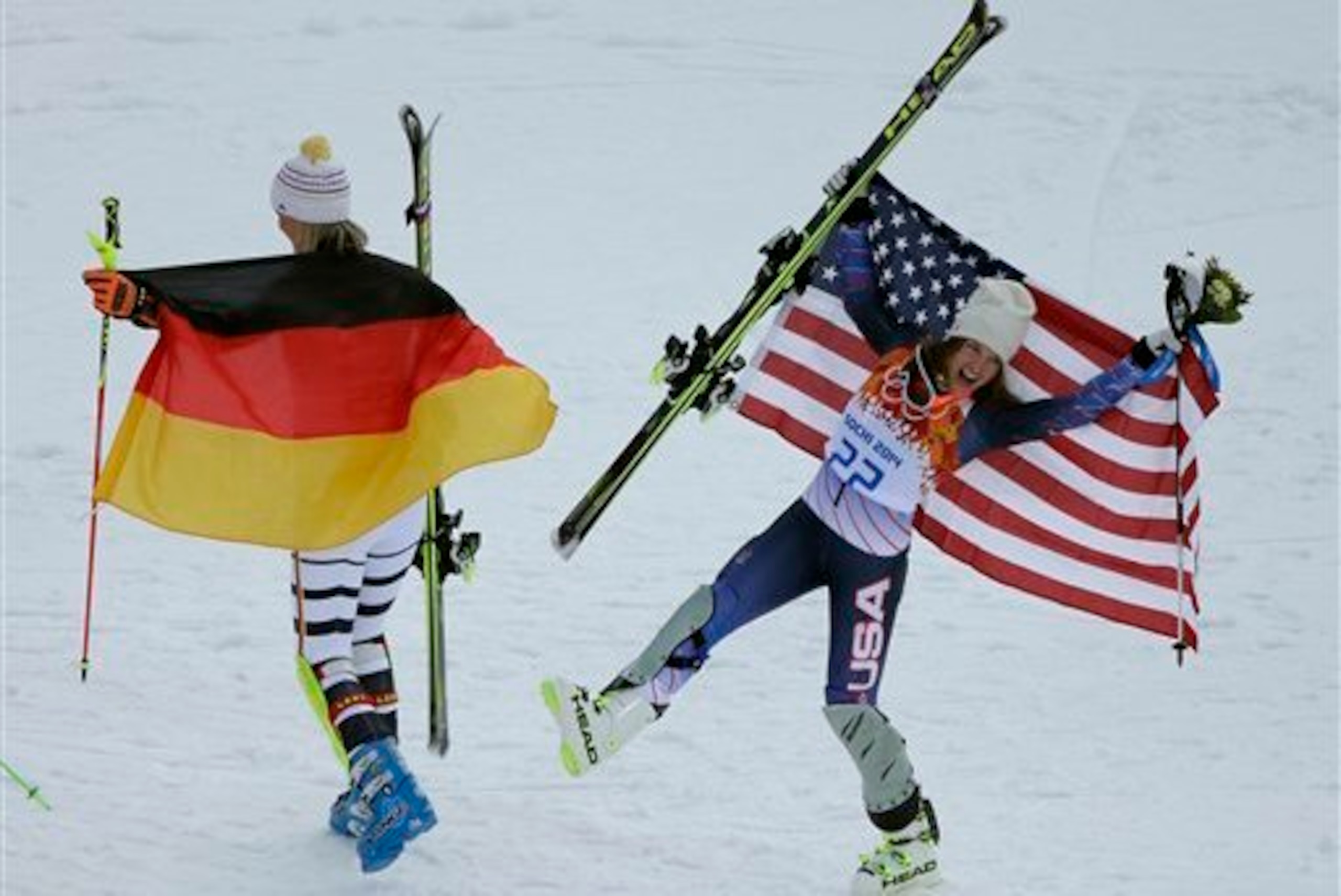 Hoefl-Riesch and Mancuso bask in the glory after their medal-winning performances.