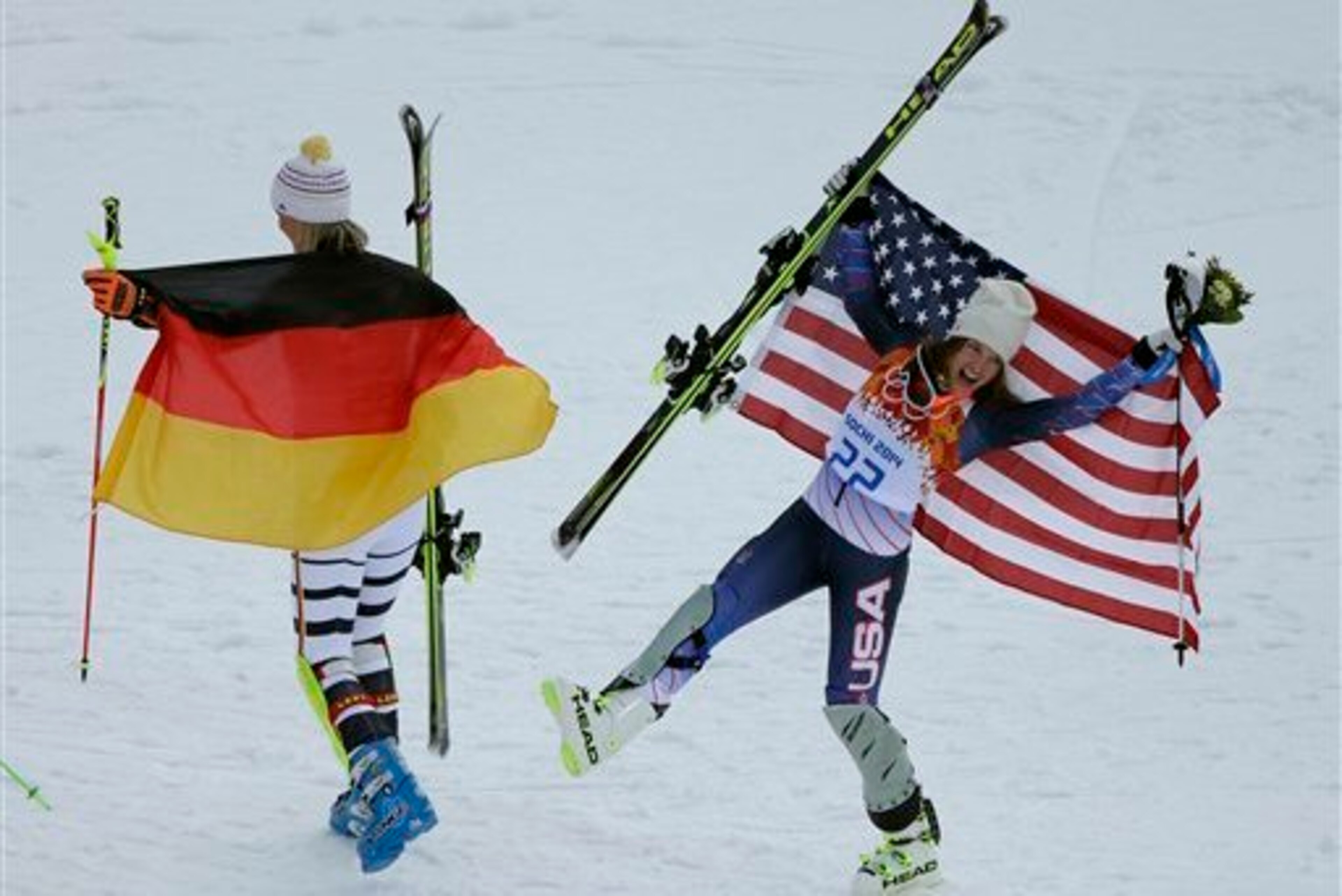 Hoefl-Riesch and Mancuso bask in the glory after their medal-winning performances.