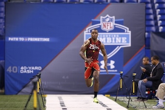INDIANAPOLIS, IN - FEBRUARY 25: Dion Jordan of Oregon runs the 40-yard dash during the 2013 NFL Combine at Lucas Oil Stadium on February 25, 2013 in Indianapolis, Indiana. (Photo by Joe Robbins/Getty Images)