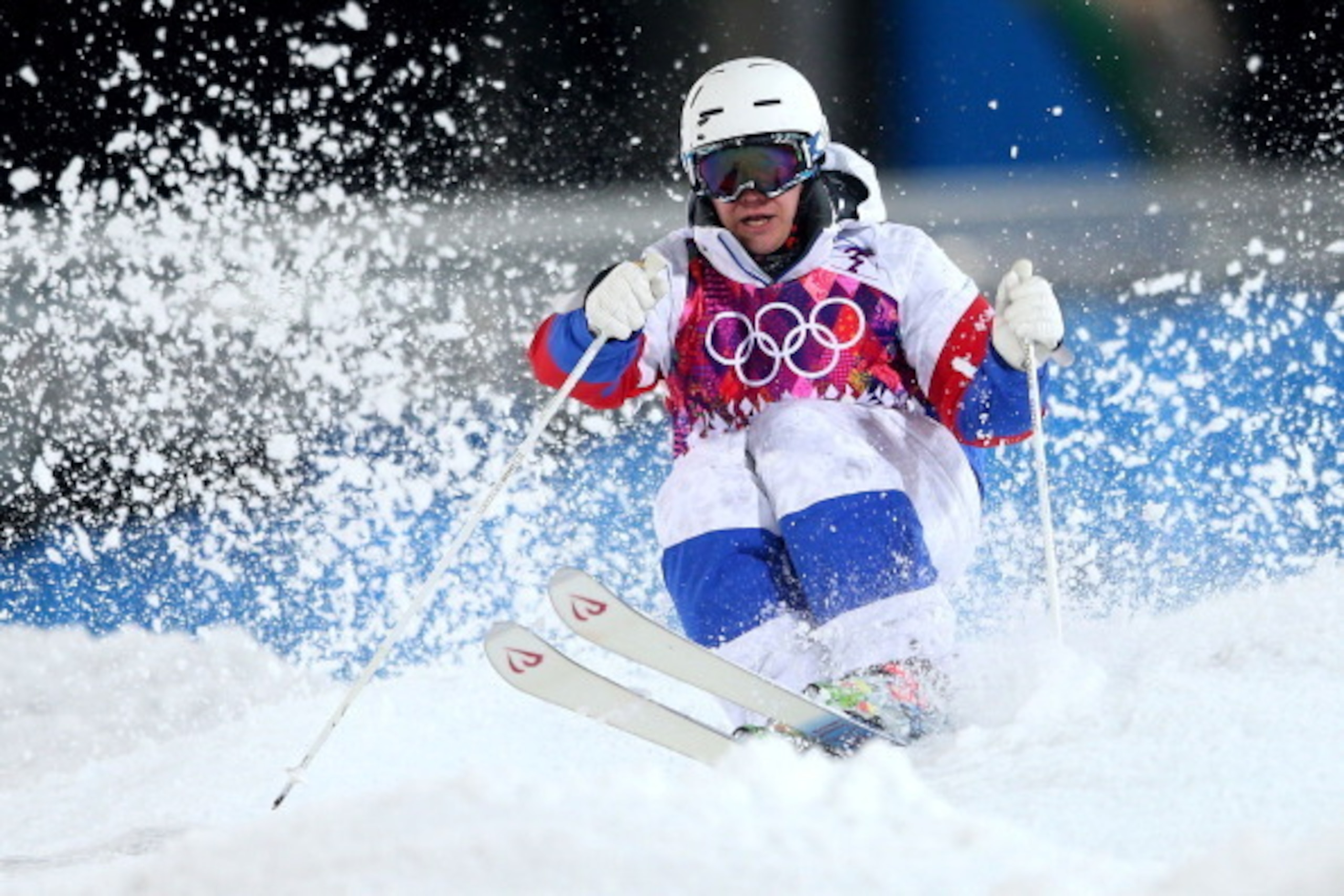 SOCHI, RUSSIA - FEBRUARY 10:  Alexandr Smyshlyaev of Russia competes in the Men's Moguls Finals on day three of the Sochi 2014 Winter Olympics at Rosa Khutor Extreme Park on February 10, 2014 in Sochi, Russia.  (Photo by Mike Ehrmann/Getty Images)