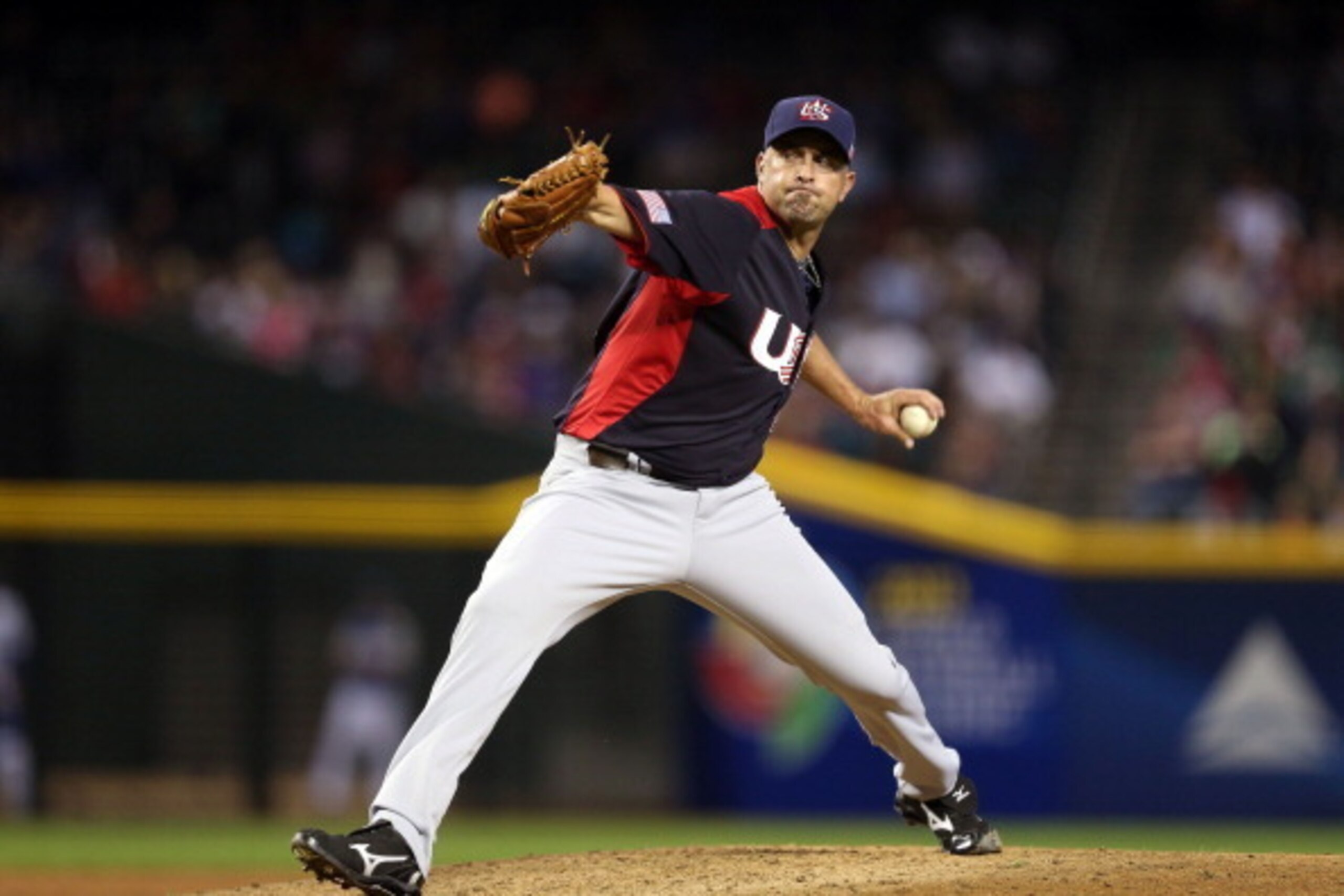 PHOENIX, AZ - MARCH 09:  Jeremy Affeldt of Team USA throws a pitch against Team Italy during the World Baseball Classic First Round Group D game at Chase Field on March 9, 2013 in Phoenix, Arizona.  (Photo by Christian Petersen/Getty Images)